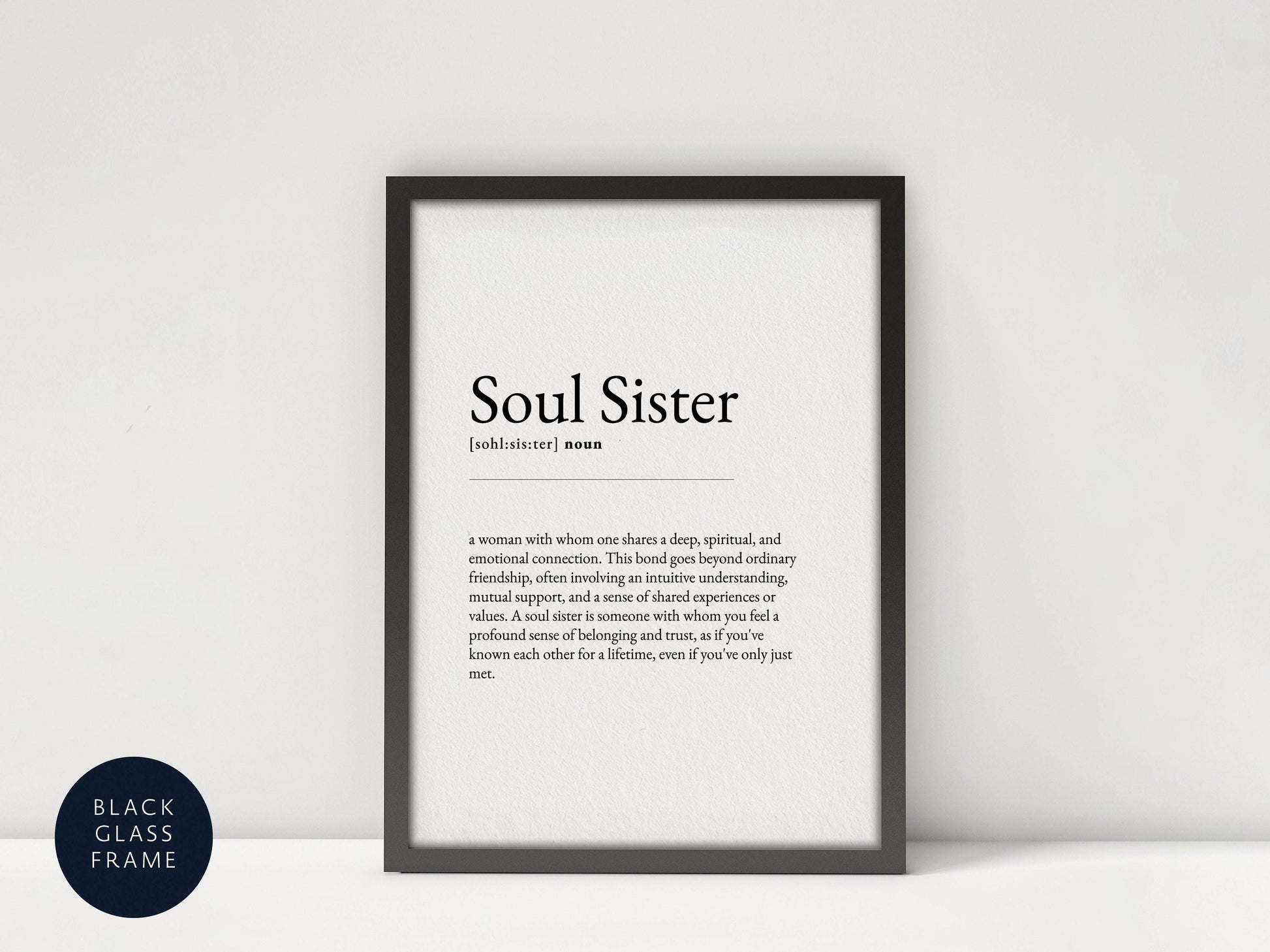 a black framed poster with a definition of a "Soul Sister" in white text.