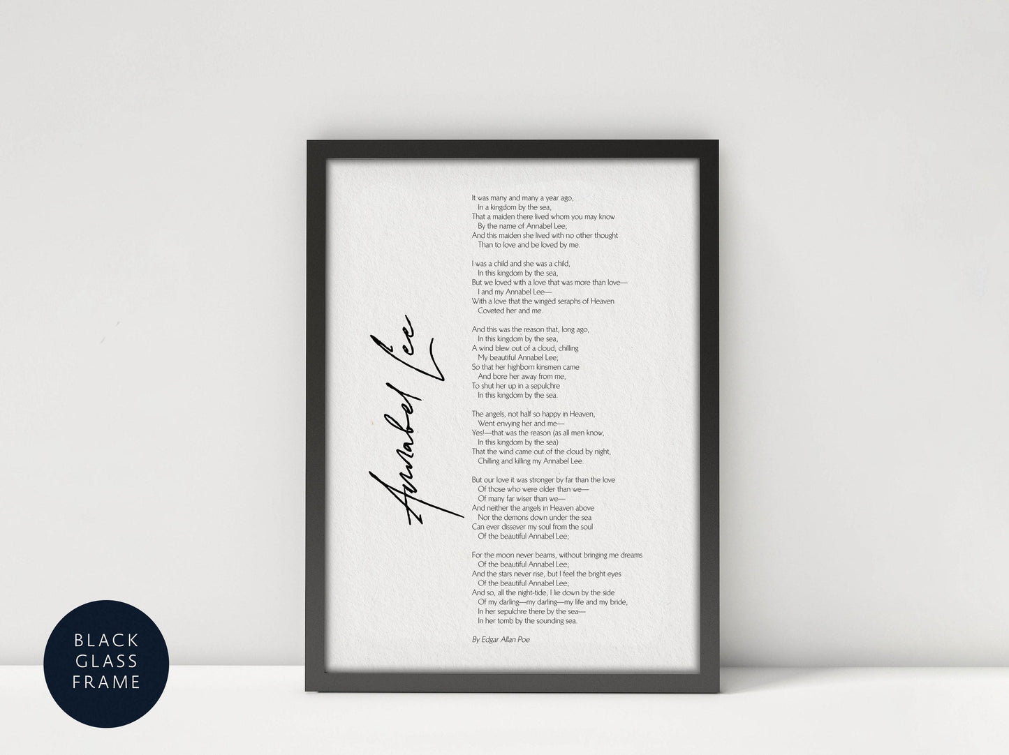 a framed poem titled "Amanda Lee" by Edna Bell Lee, which is a black and white photograph of a framed poem.