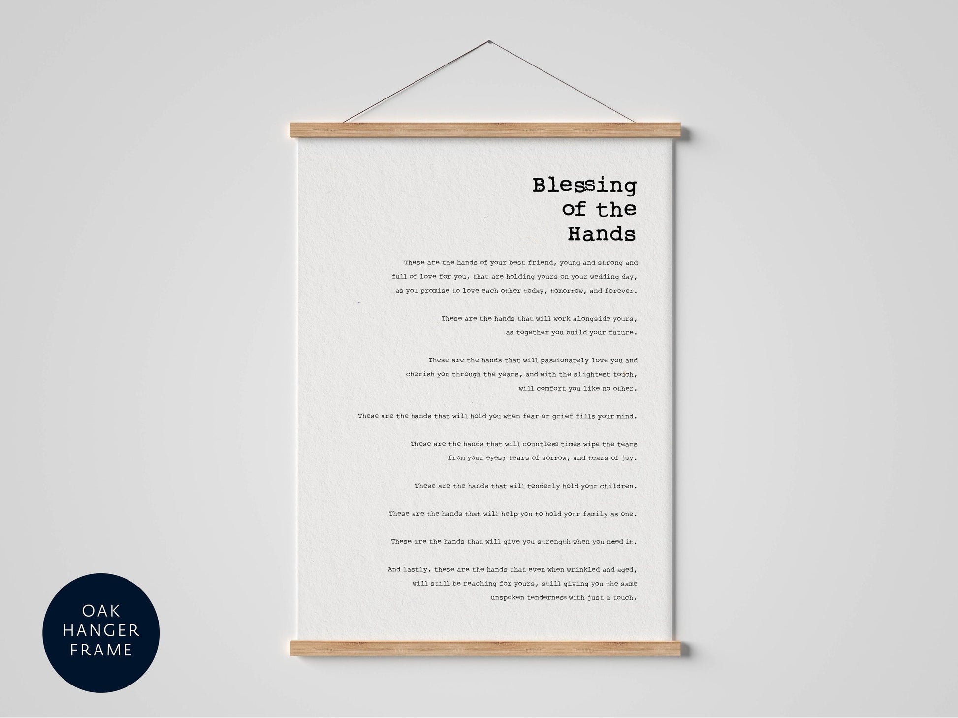 The image is a framed print with a poem titled "Blessing of the Hands" hanging on a wall.