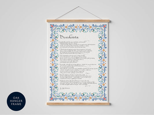 a poster with a decorative border and ornate text, hanging on a wall.