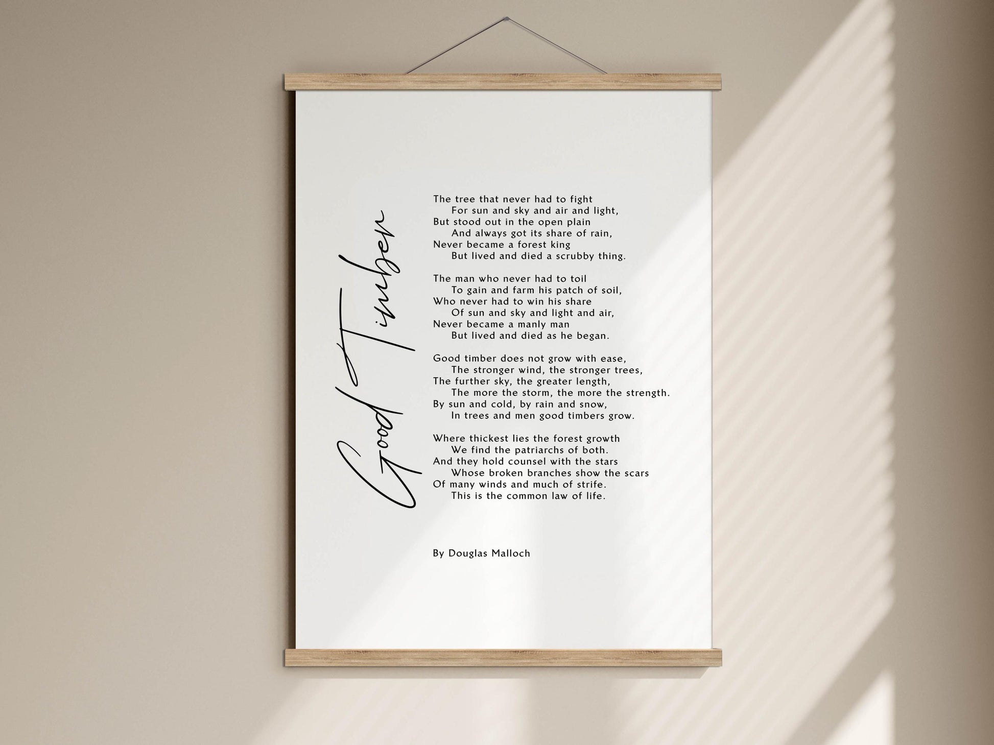 a poem titled "Good Together" by Douglas Malloch. The poem is written in black ink on a white background, and it is framed with a wooden border. The poem is about the beauty of nature and the importance of friendship.