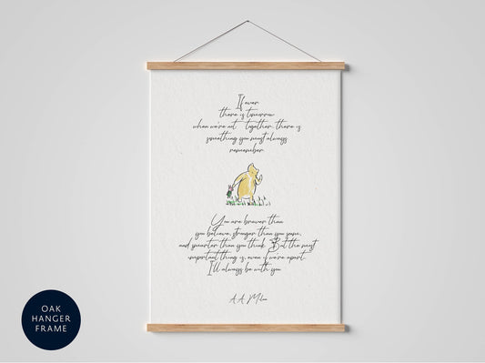 The image is a framed print featuring a quote from the classic children's book " Winnie the Pooh" by A. A. Milne. The quote is written in a cursive font and is accompanied by an illustration of the beloved character, Winnie the Pooh. The quote is displayed on a white background, and the frame is hanging on a wall.