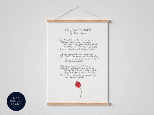 a framed poem titled "In Flowers Fields" by John McCrae.