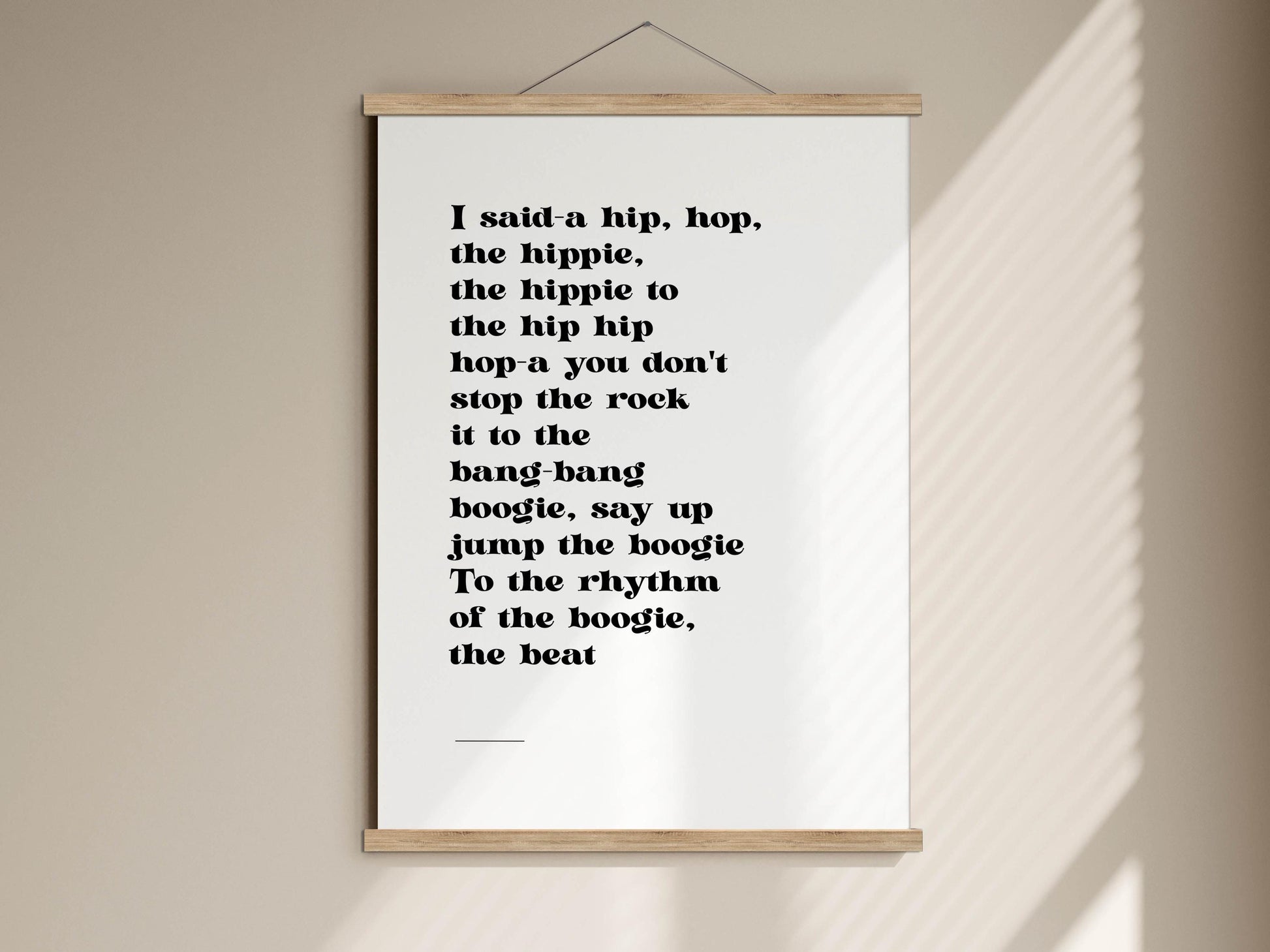 a poster with a quote about the hippie lifestyle, including phrases like " Said-a hip, hop, the hippie to the hip hip hop a you don't stop the rock it to the bang-bang boogie, say up jump the boogie To the rhythm of the boogie, the beat".