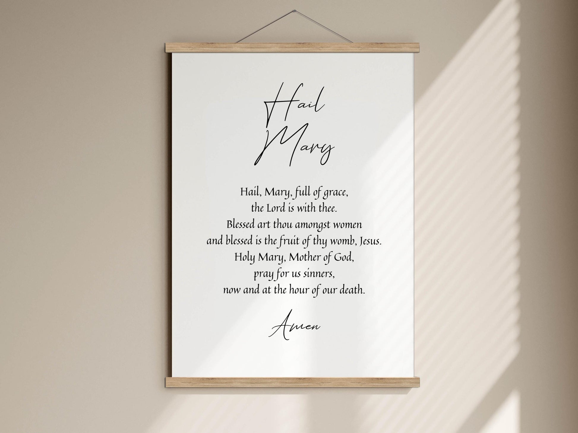 a poster with a religious text, hanging on a wall.