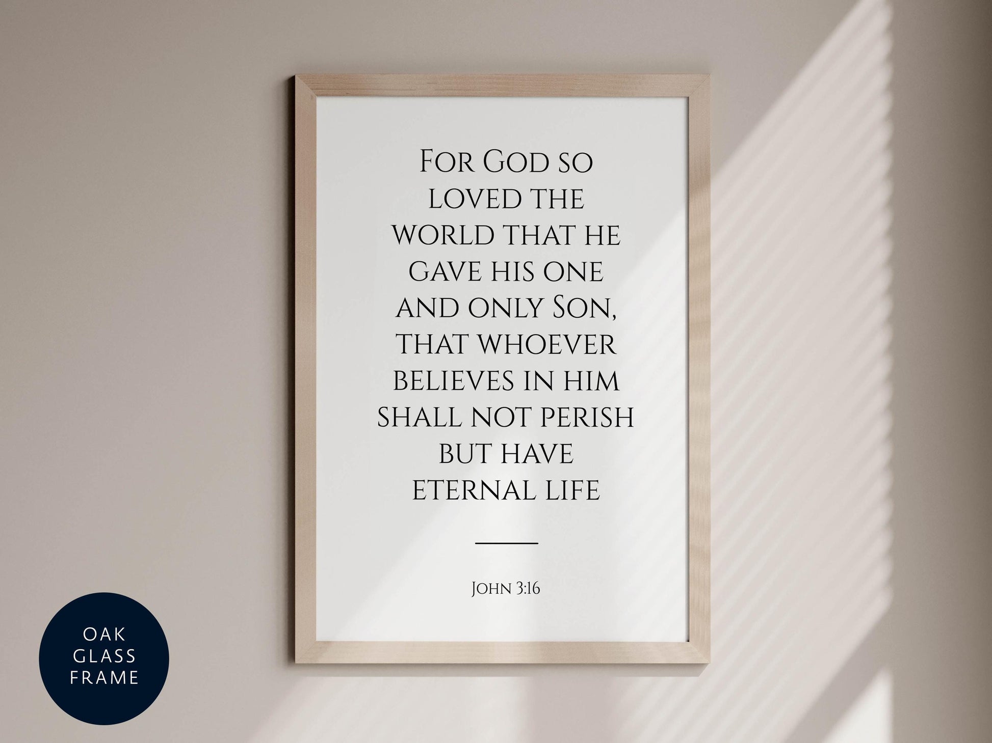 a framed quote from the Bible, specifically John 3:6, which states "For God so loved the world that he gave his one and only son, that whoever believed in him shall not perish but have eternal life."