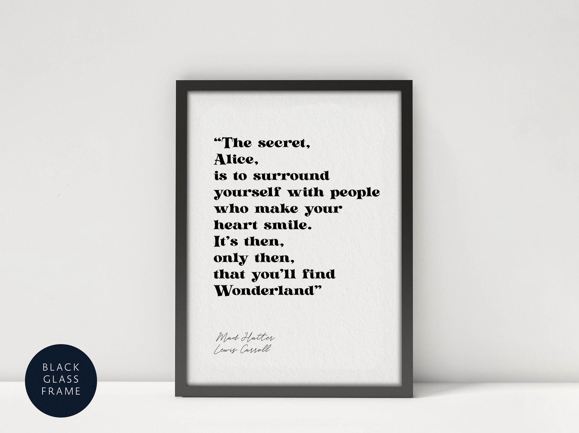 a framed quote by Mark Twain, "The secret, Alice, is to surround yourself with people who make your heart smile. It's then, only then, that you'll find Wonderland."
