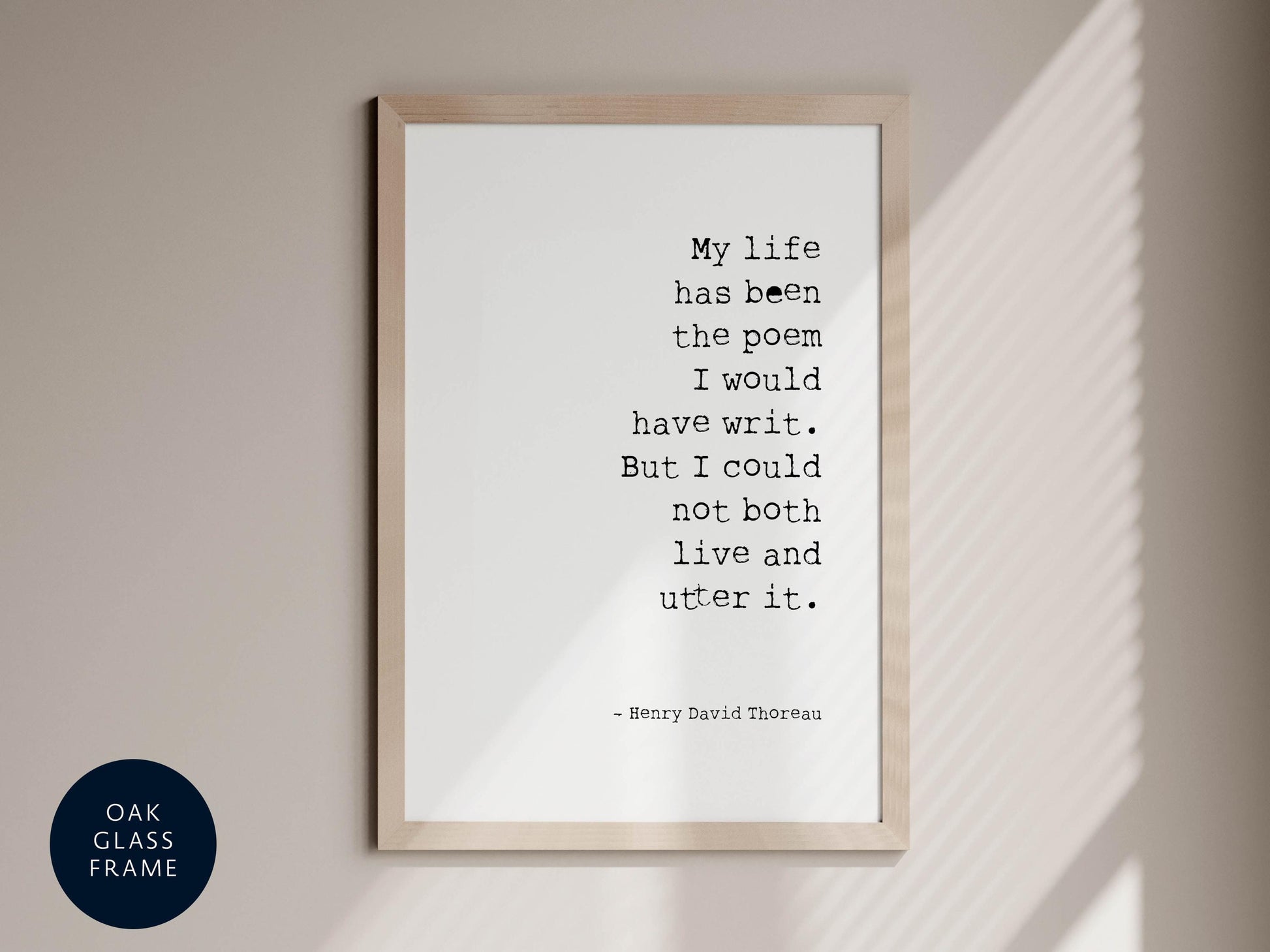 a framed quote by Henry David Thoreau, which reads: "My life has been the poem I would have written. But I could not both live andutter it."