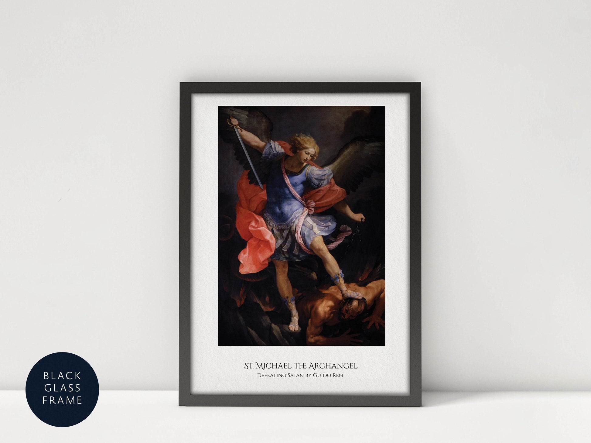 The image is a framed painting depicting St. Michael the Archangel, with the text "ST. MICHAEL THE ARCHANGEL" below the artwork.
