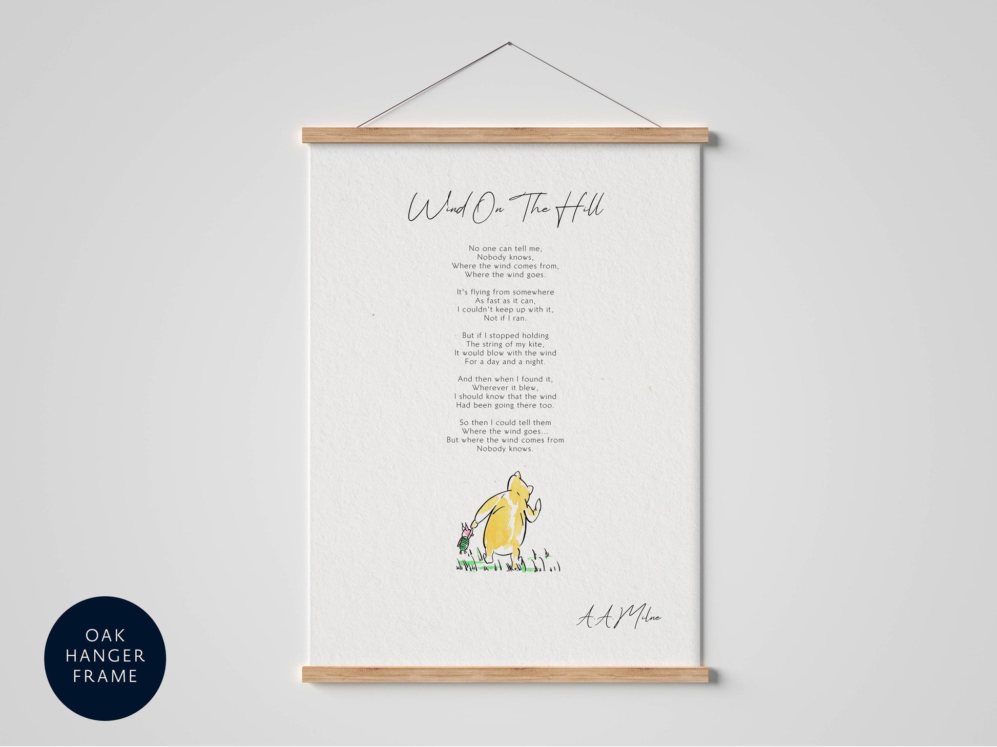 a framed poster with a poem titled "Wind O' the Hill" by A. A. Milne.