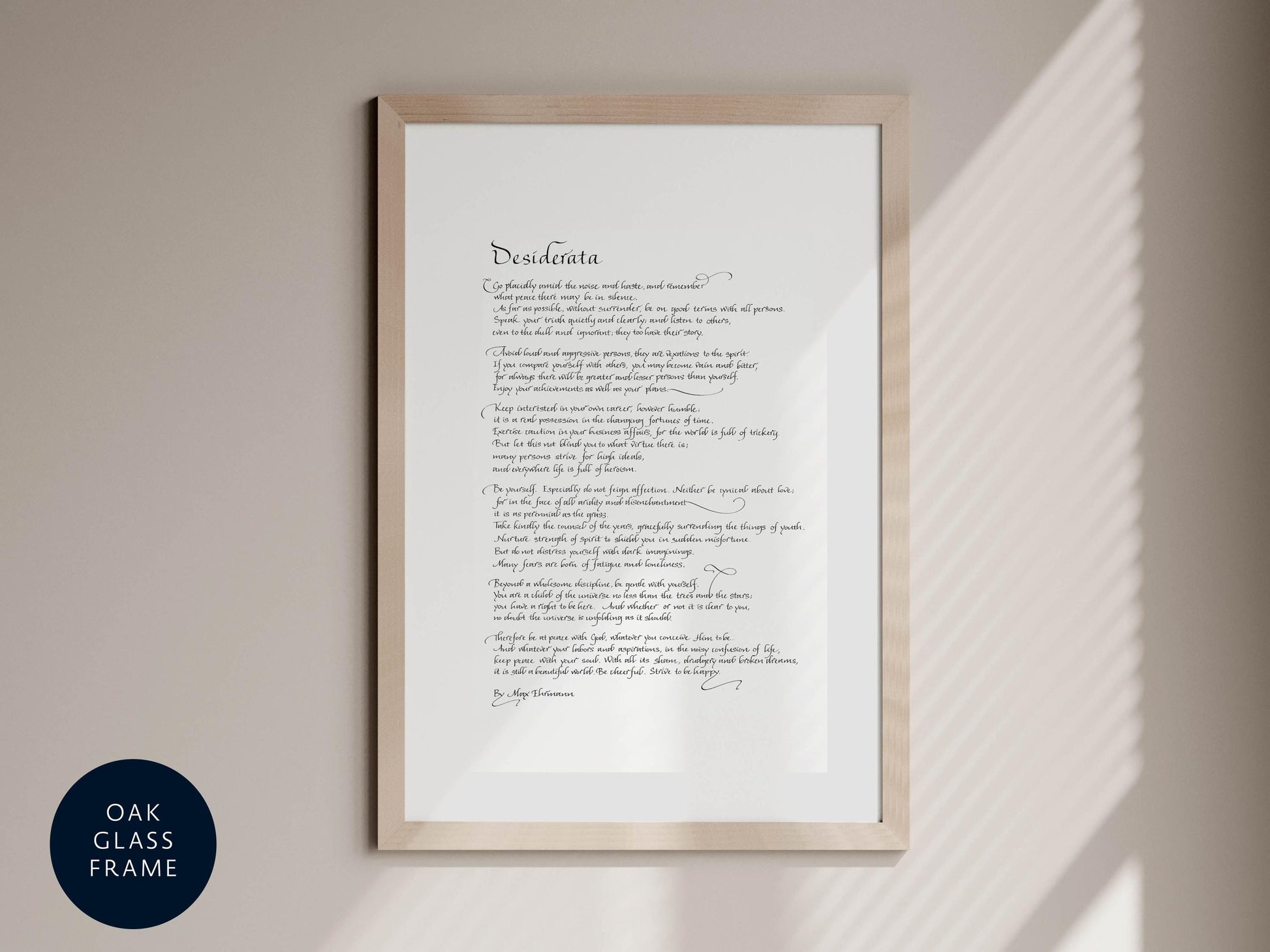 a framed piece of paper with handwritten text on it, which appears to be a poem or a song lyrics.