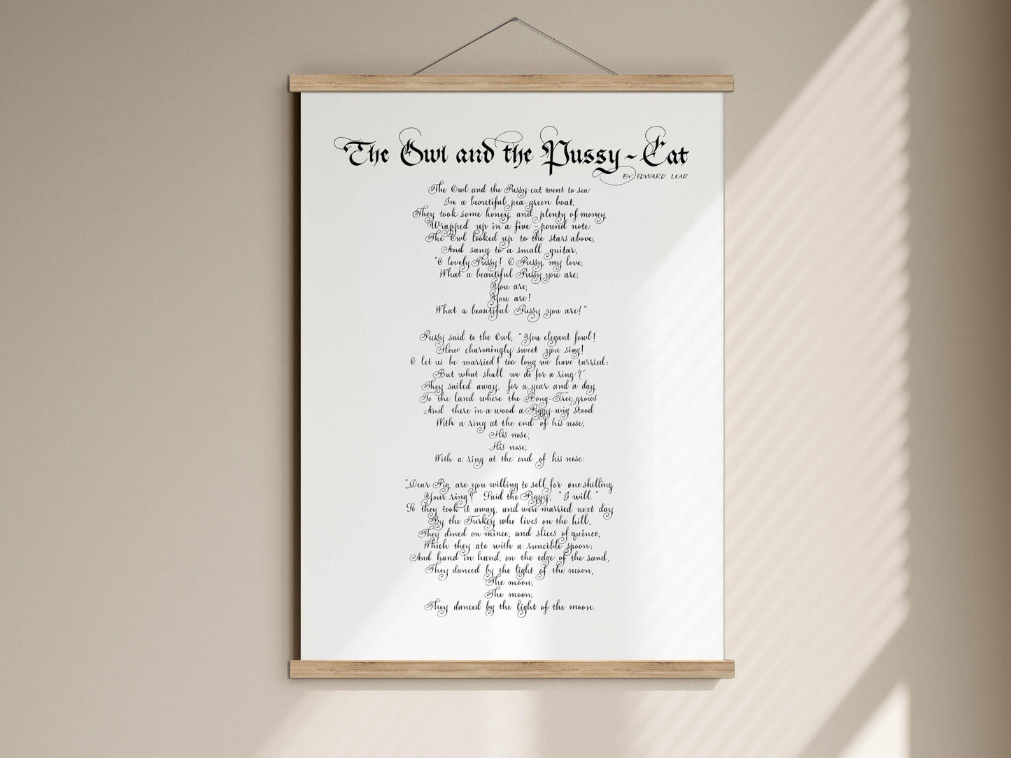 The image is a framed print of a poem titled "The Owl and the Pussy-Cat" by Robert Louis Stevenson.