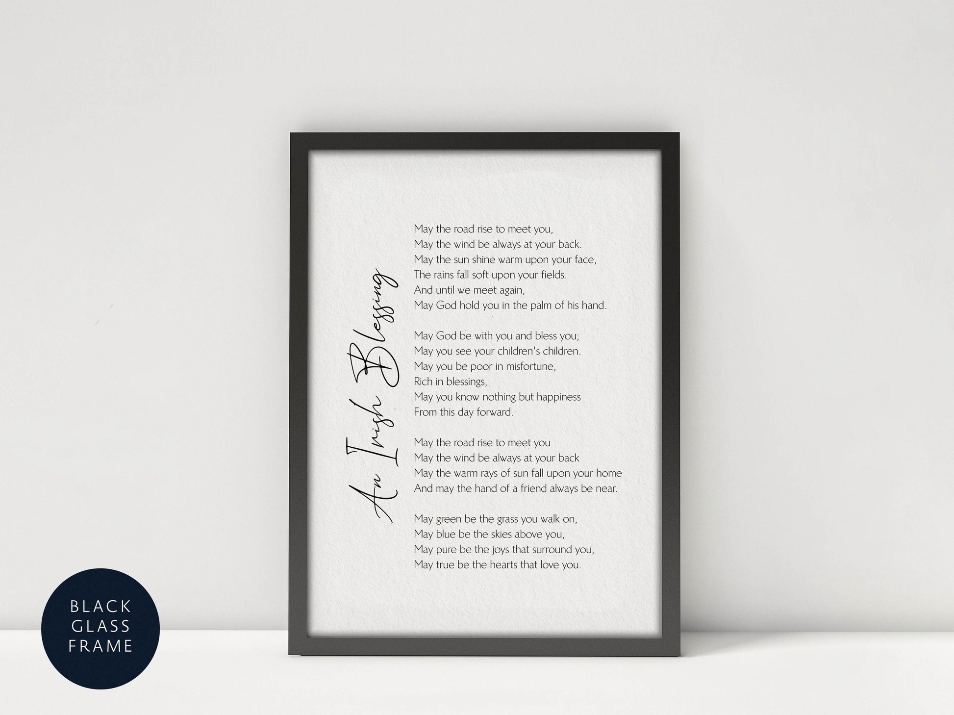 The image is a framed print of a poem titled "An Irish Blessing" with a black and white color scheme.