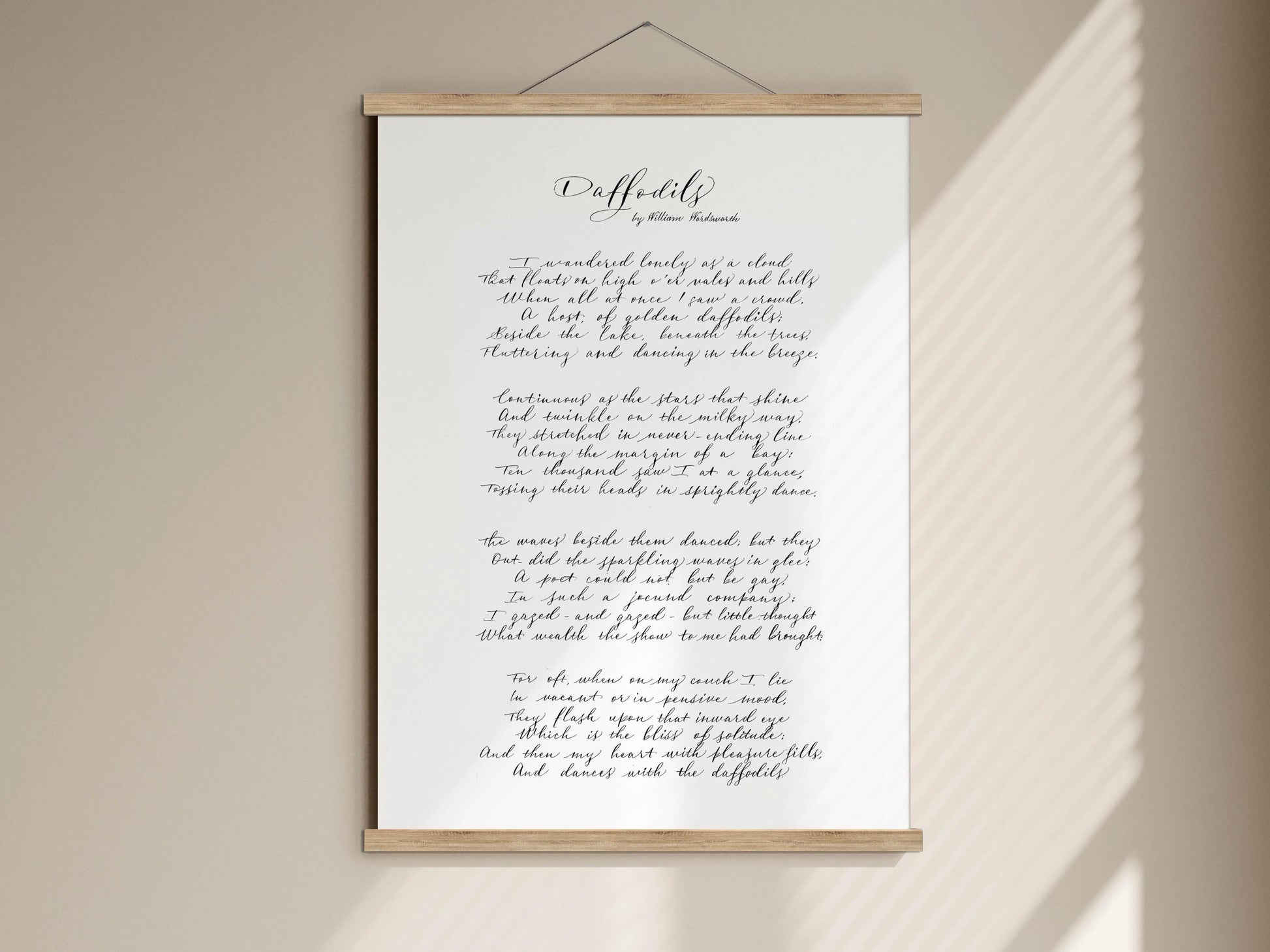 The image is a framed print of a poem titled "Daffodils" by William Wordsworth.