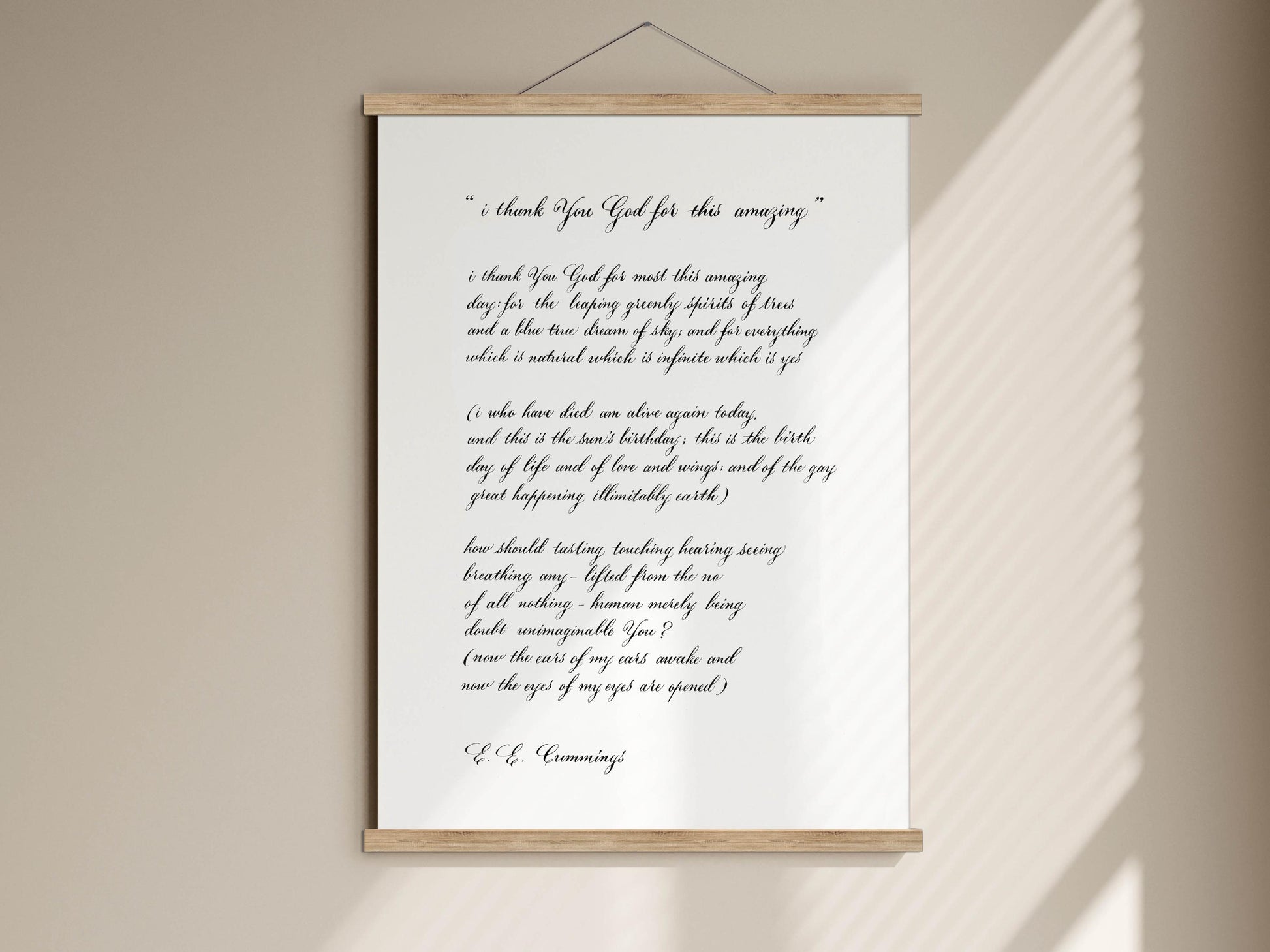 a framed print with a handwritten message on a wall.
