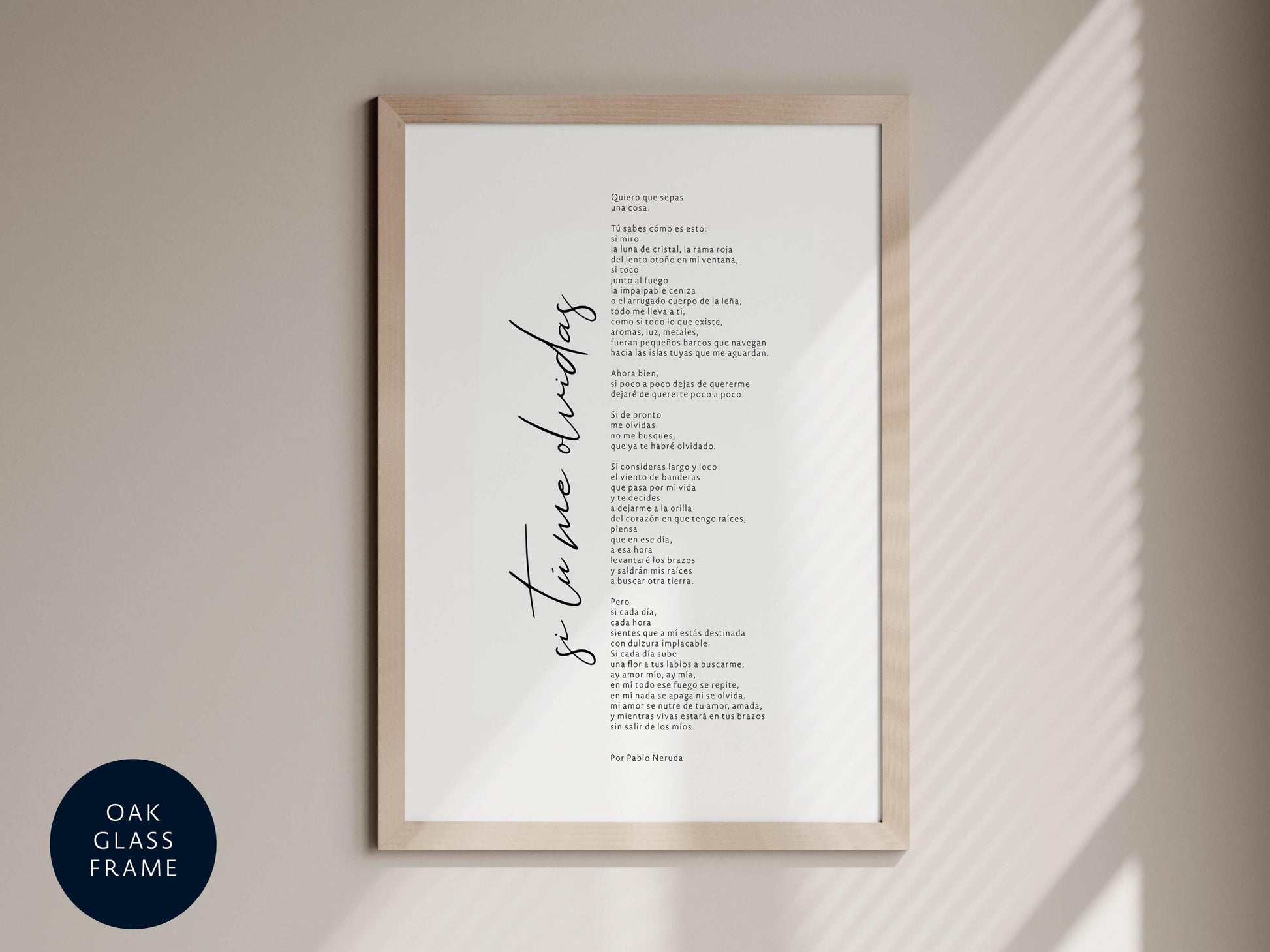 a framed print of a poem with a black and white color scheme. The text is written in a cursive font and is displayed in a wooden frame.