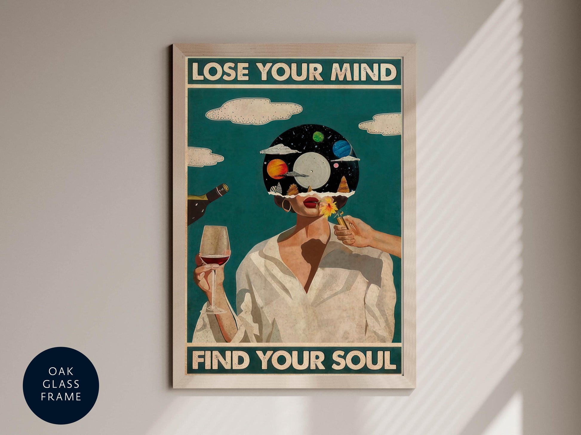 The image is a framed poster with a woman wearing a white dress and holding a wine glass, with a space-themed background. The text on the poster reads "LOSE YOUR MIND FIND YOUR SOUL".