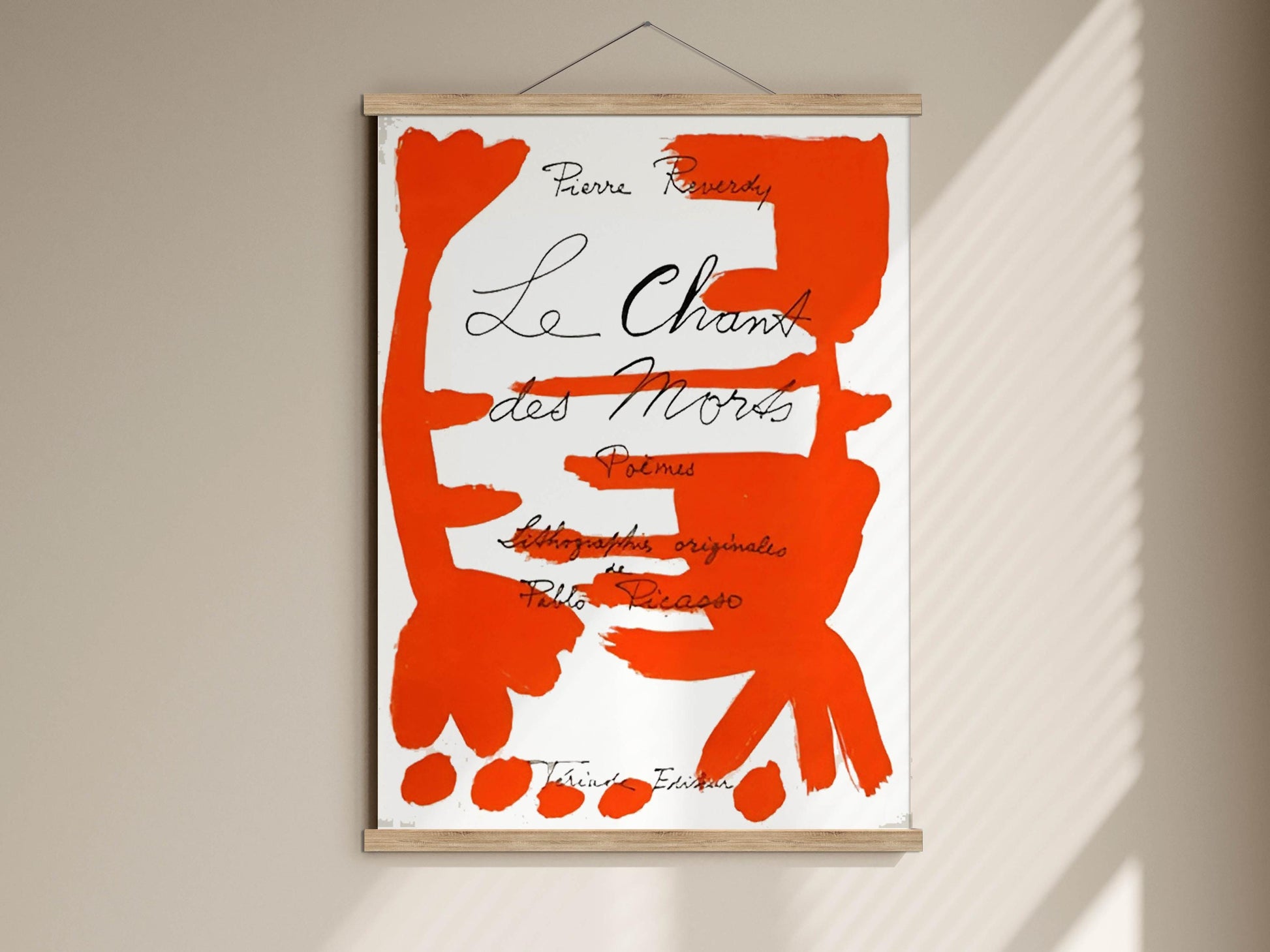The image is a poster with a large red abstract design and text.