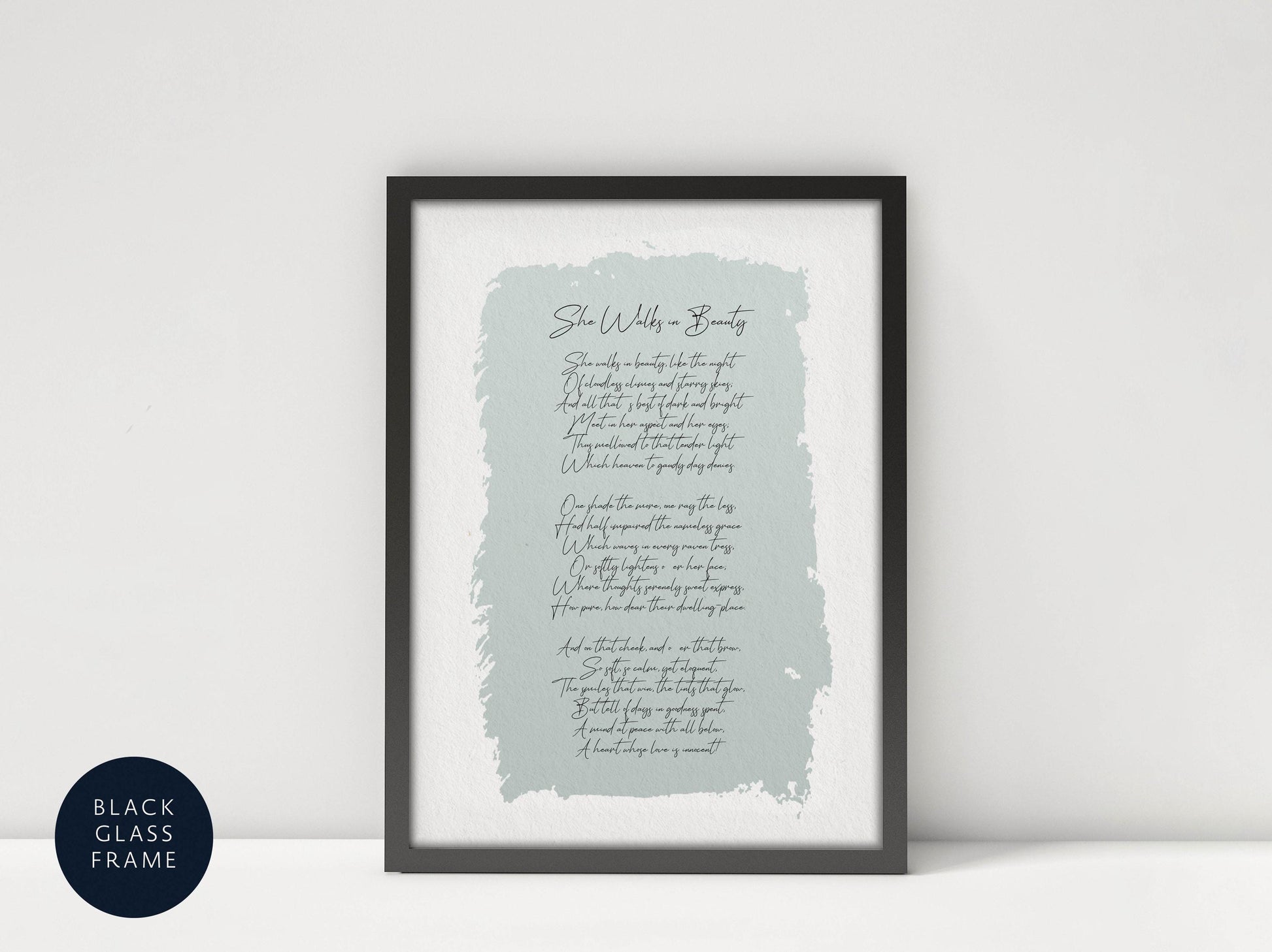 a framed print with a light blue background and black text, which appears to be a poem or lyrics.