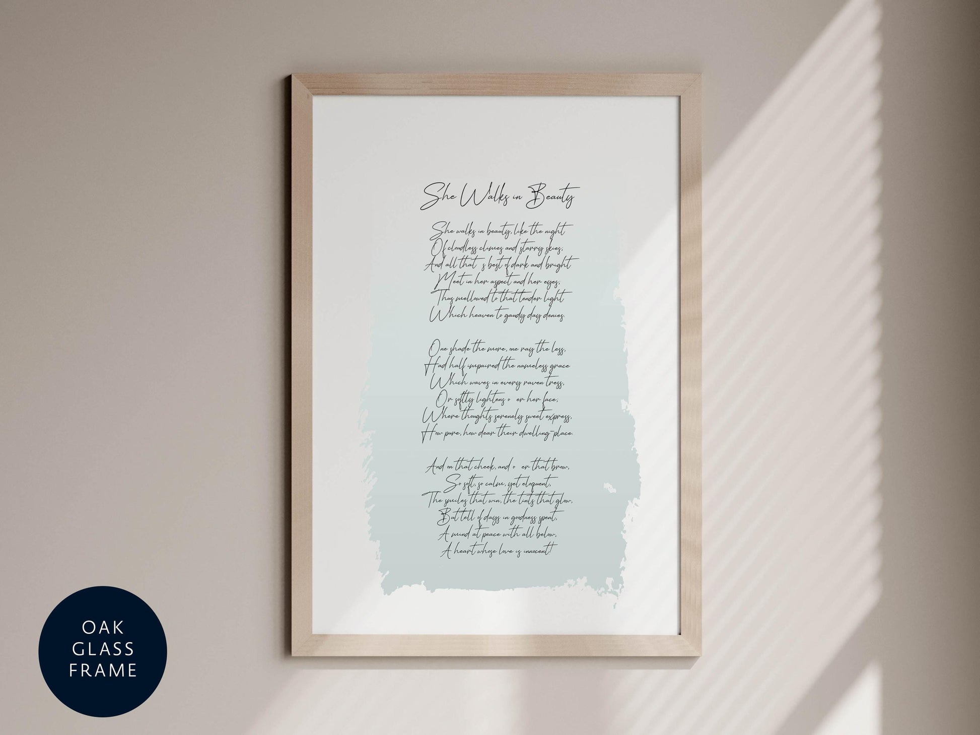 a framed print with a poem or lyrics on it, hanging on a wall.