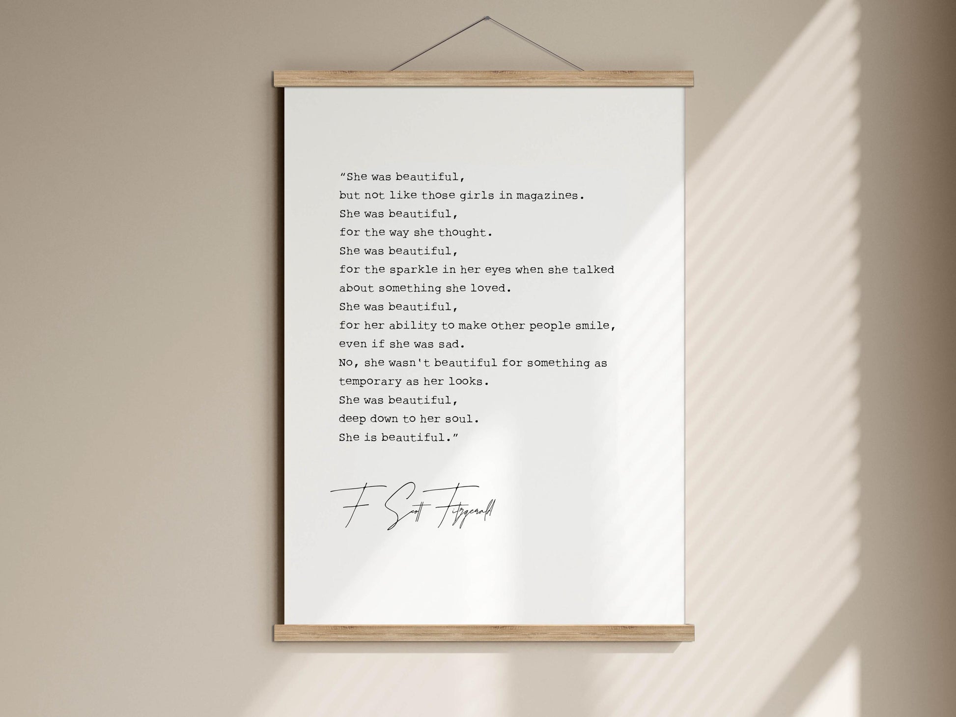 a quote about a woman's beauty, which is described as a quote on a poster. The quote is in black text and is centered on the poster.