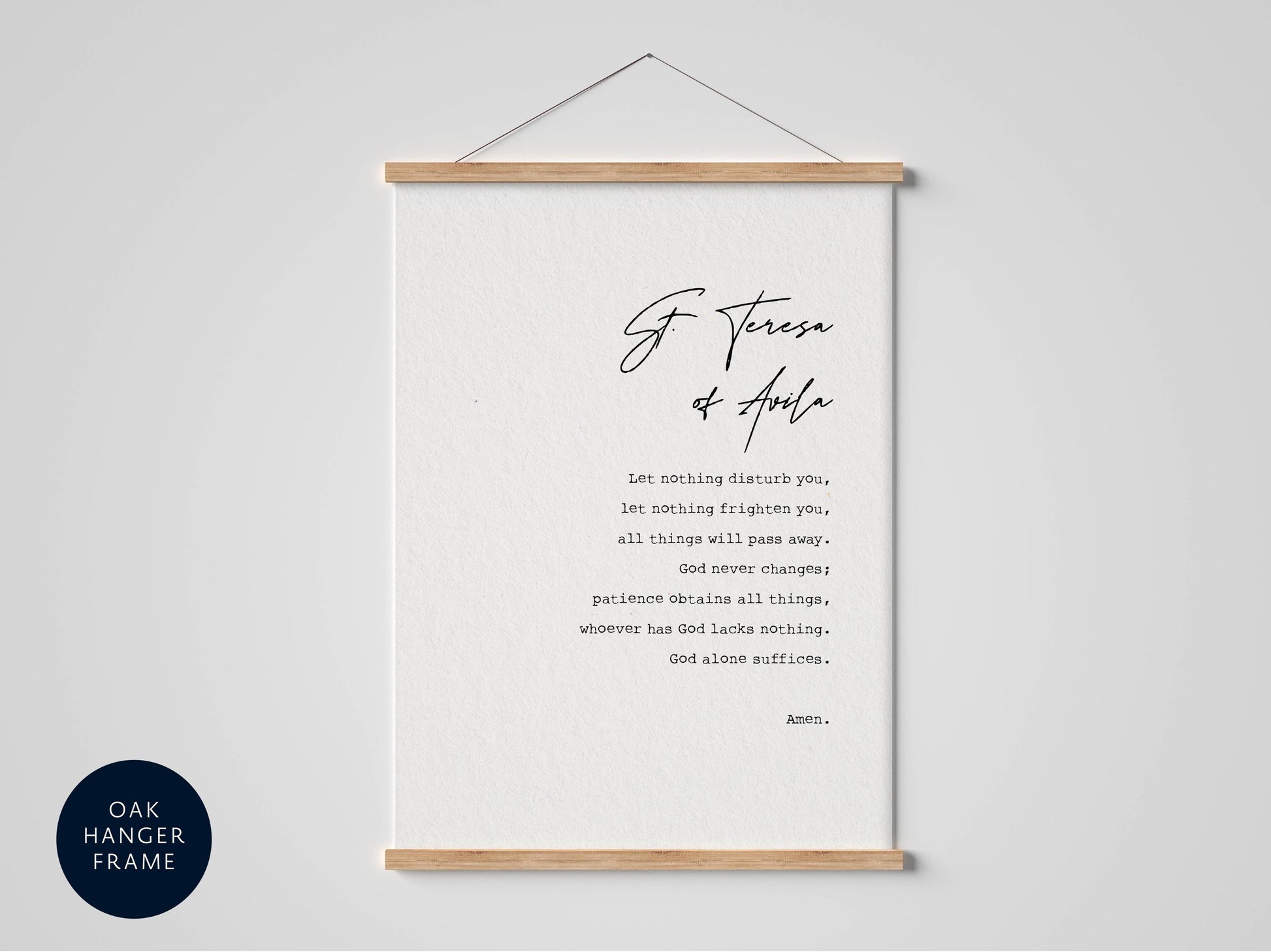 a white poster with black text and a wooden hanger frame.