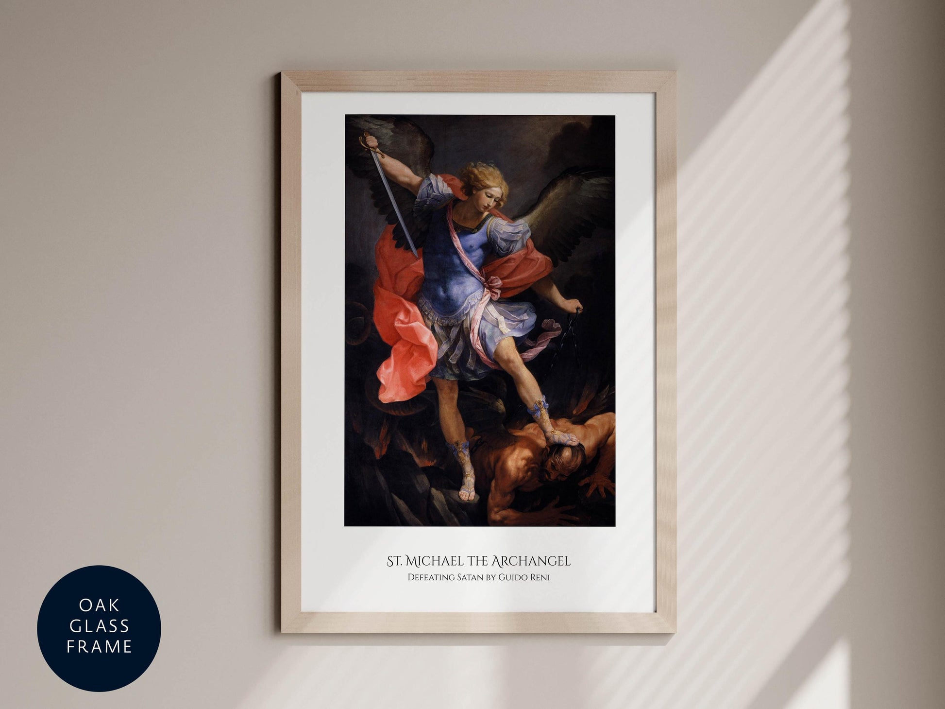 The image is a framed painting depicting the angel St. Michael, who is shown in a dramatic pose with a sword, standing over a fallen figure.