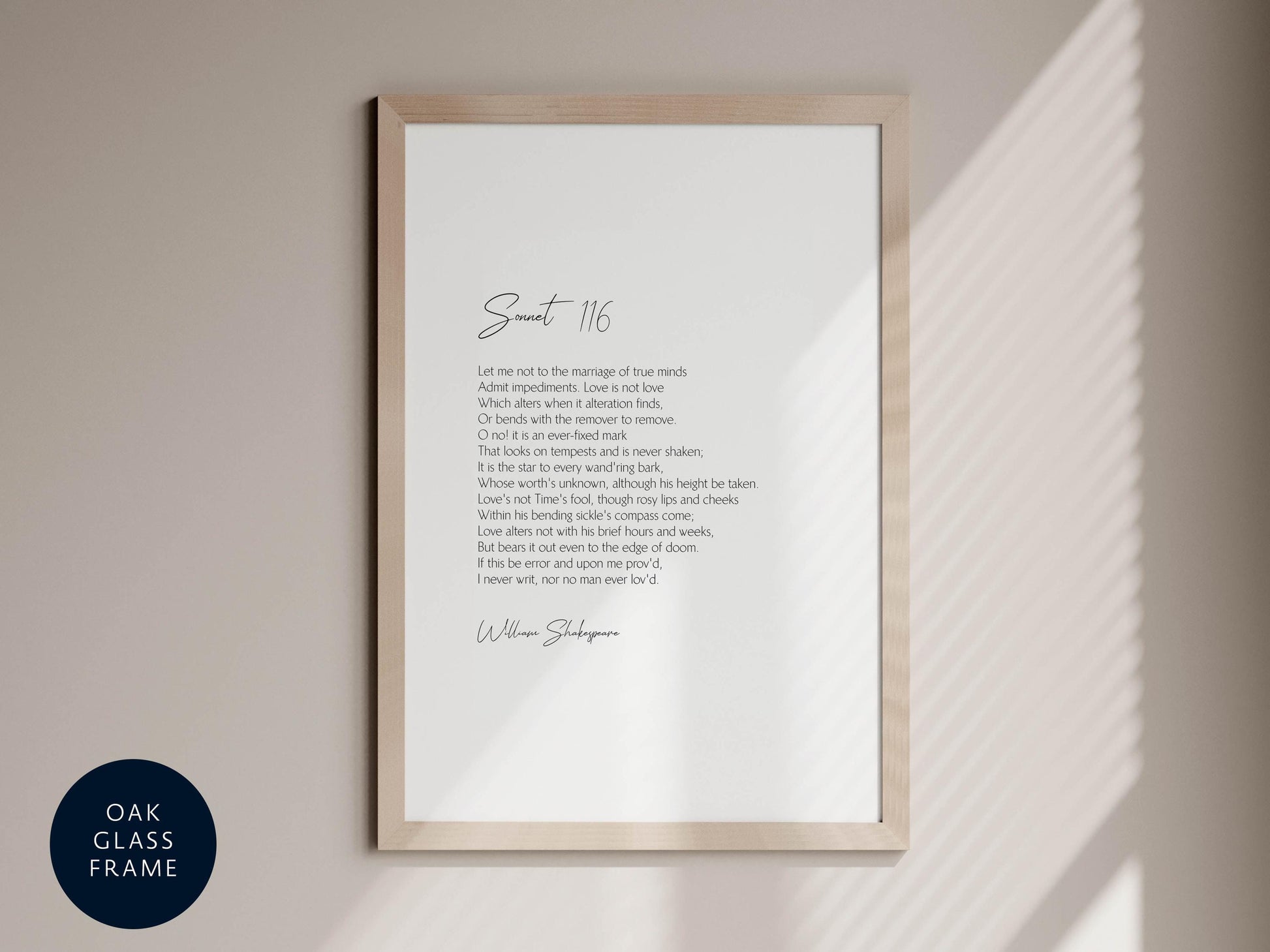 a framed print of a poem titled "Soutt 116" by William Shakespeare, with a black and white color scheme.