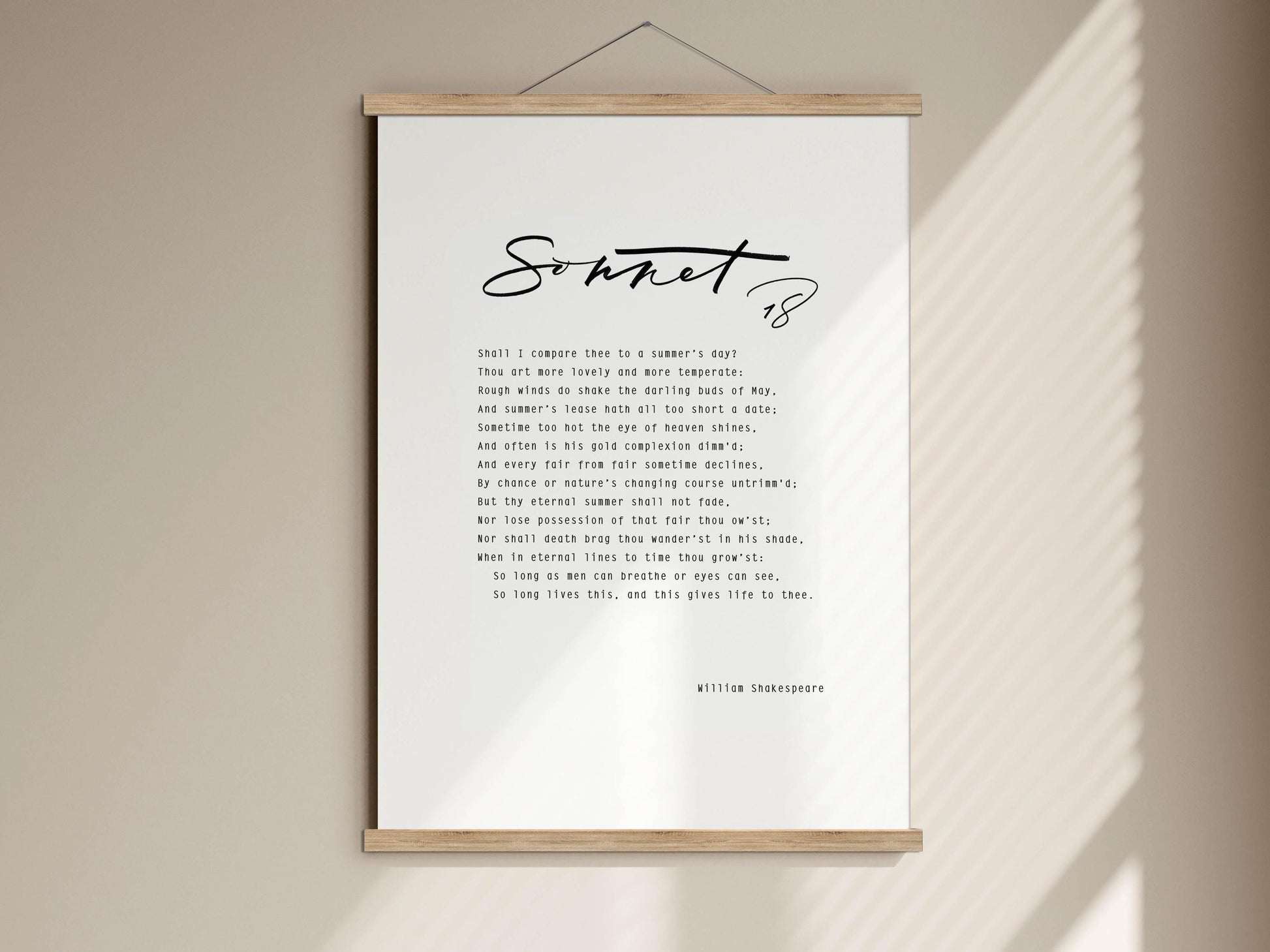 a text that is a quote from William Shakespeare, which is displayed on a white poster board.