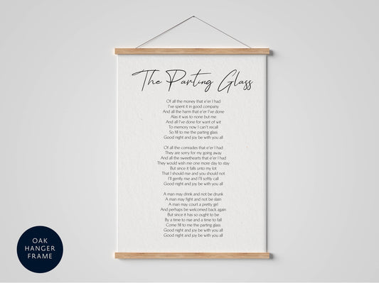a framed poem titled "The Parting Glass" with a wooden frame. The poem is written in a cursive font and is displayed on a white background.
