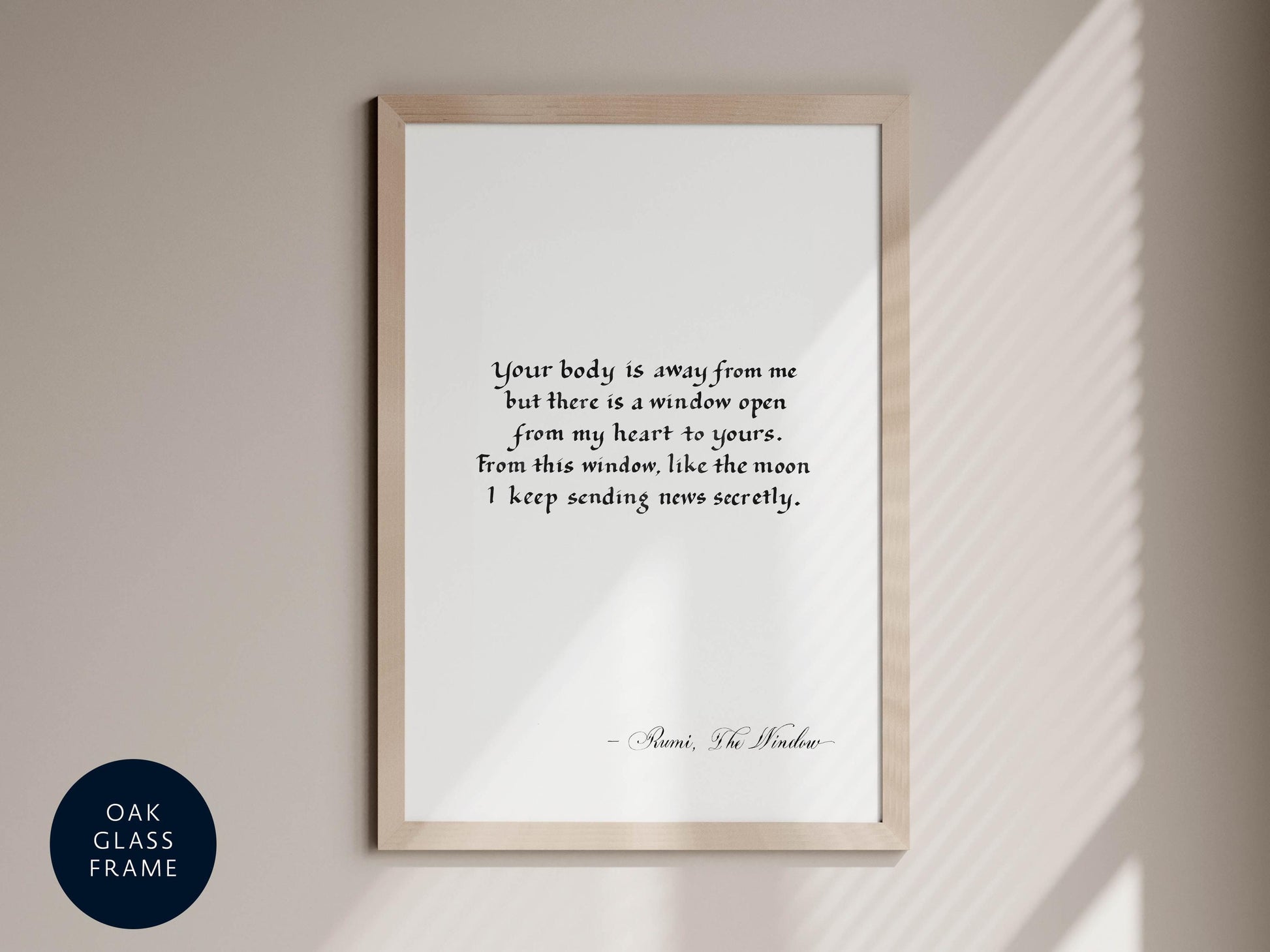 a framed quote by Rumi, "Your body is away from me, but there is a window open from my heart to yours. From this window, like the moon I keep sending news securely."