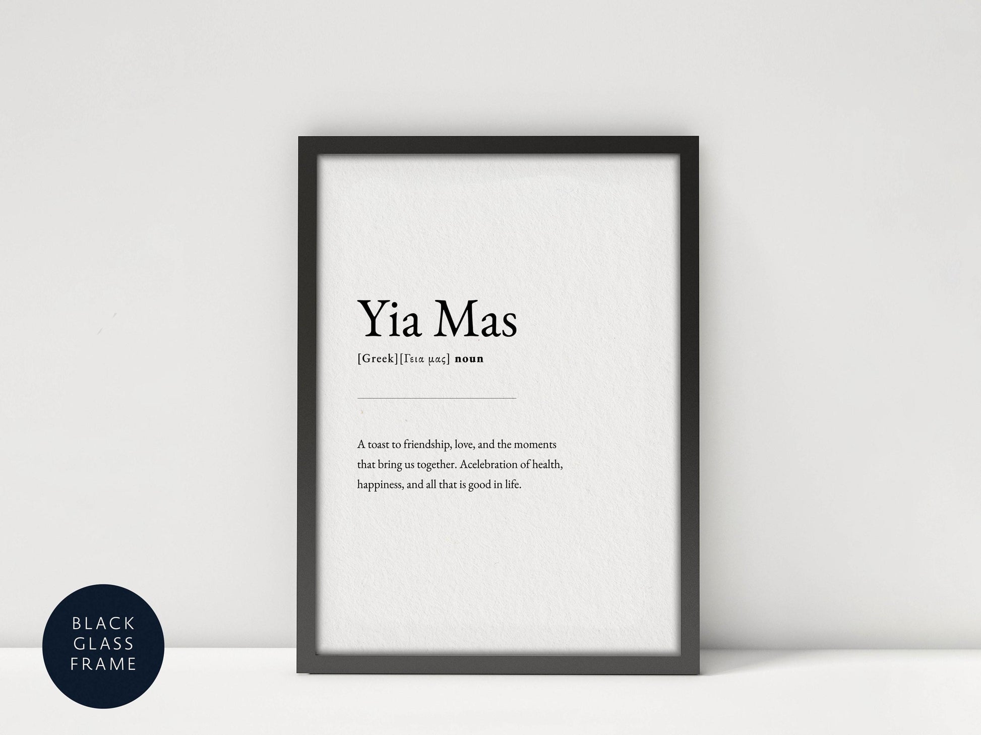 A framed definition of 'Yia Mas' against a white background, with a black border.