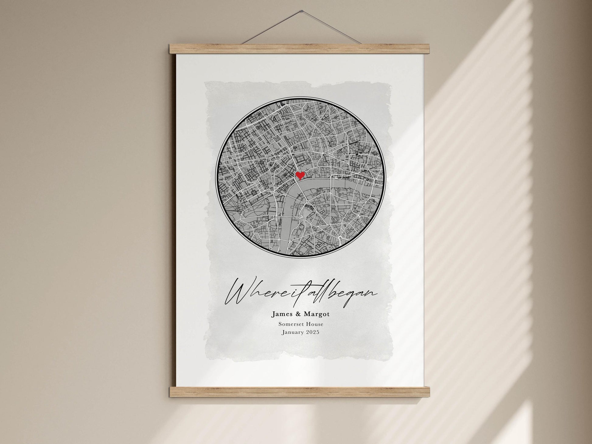 The image is a framed print featuring a map of London with a red heart symbol, and it is titled "Where it all began" and includes the names "James & Margie" and the date "January 2023".