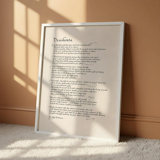 a handwritten poem on a white scroll, which is mounted on a wall.