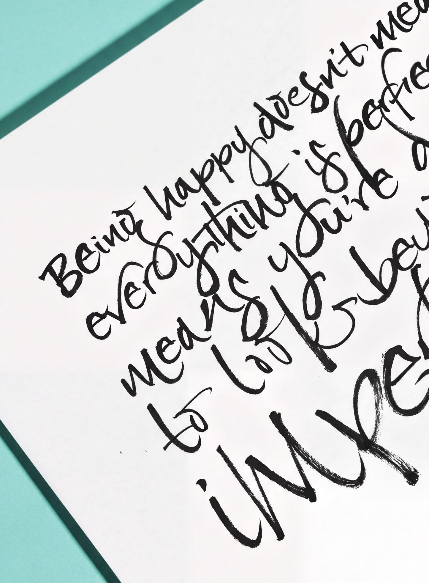 a handwritten text that reads "Being happy doesn't mean everything is perfect. It means you're doing the best you can. To be happy, you need to be imperfect."