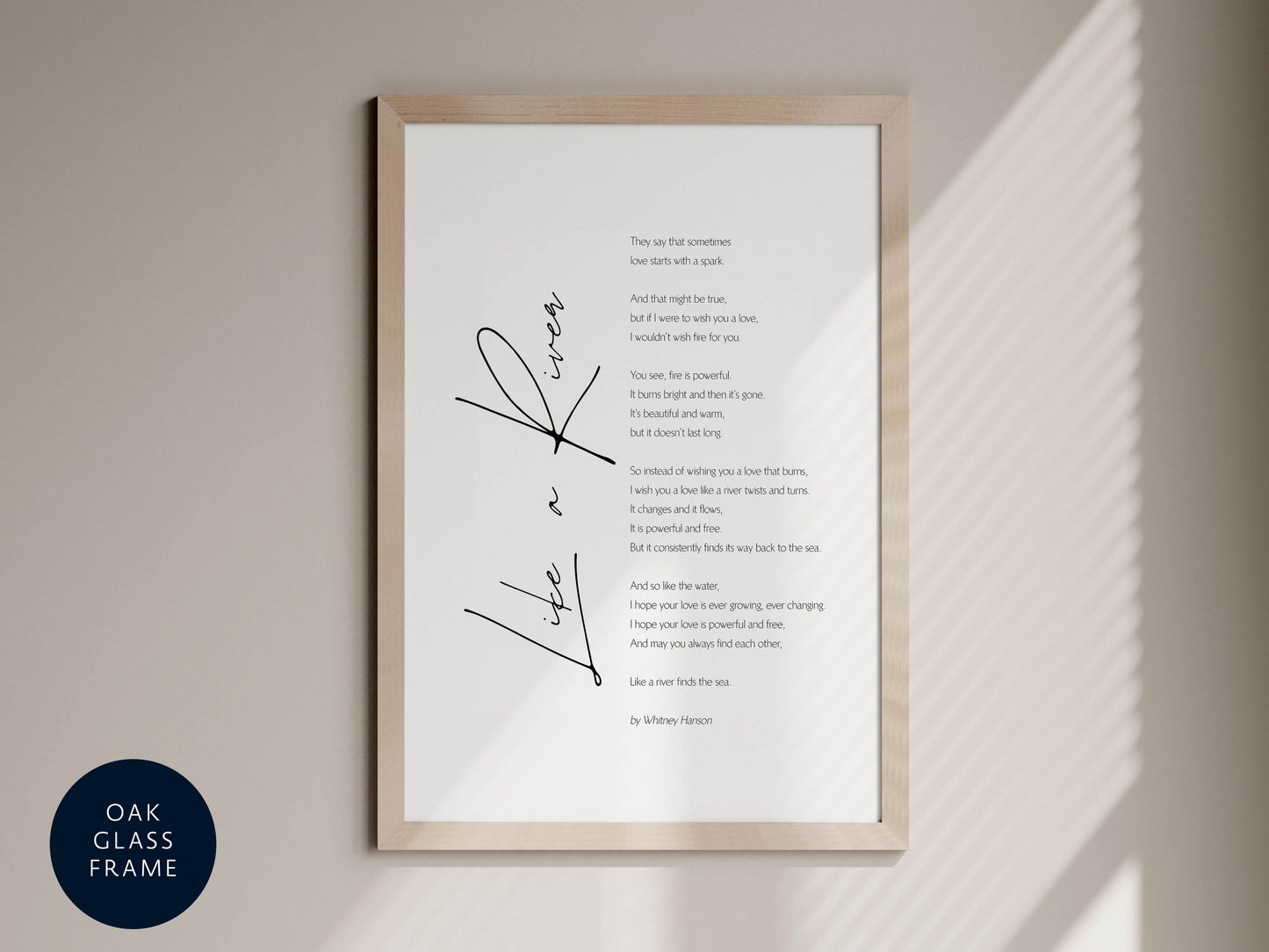 a framed poem titled "Life is a River" by Whitewater, written by Whitewater. The poem is displayed on a wall, and the text is written in a cursive font.