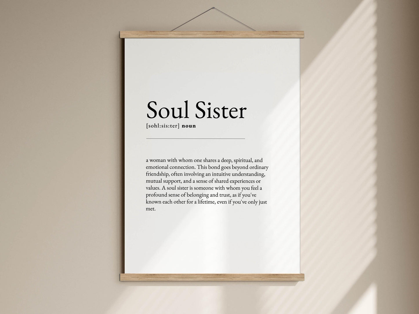 a definition of a &quot;Soul Sister&quot; hanging on a wall.