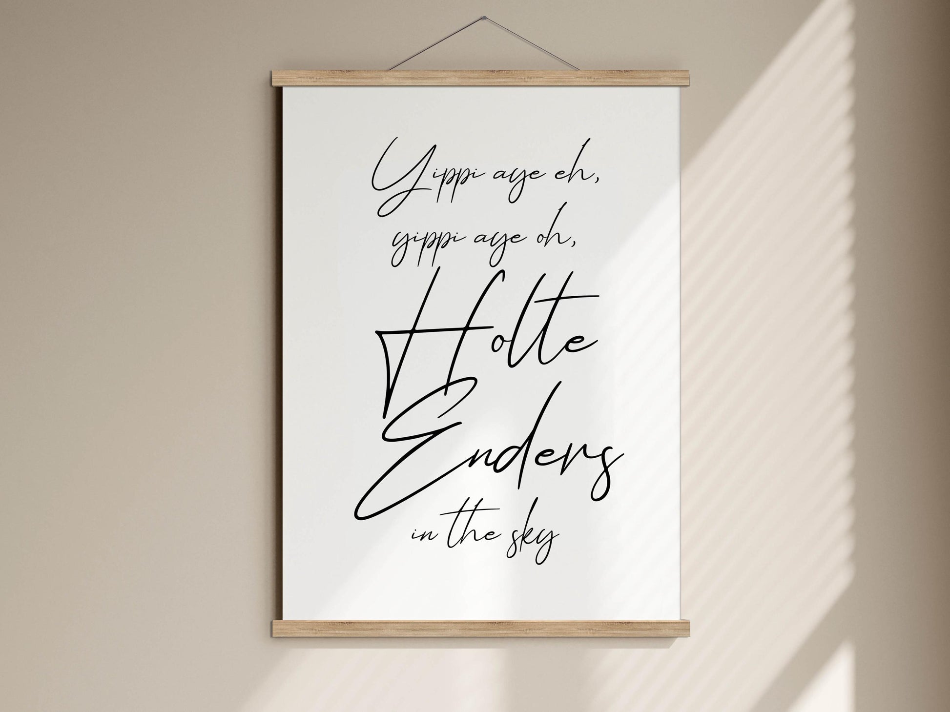 a picture hanging on a wall with a quote on it