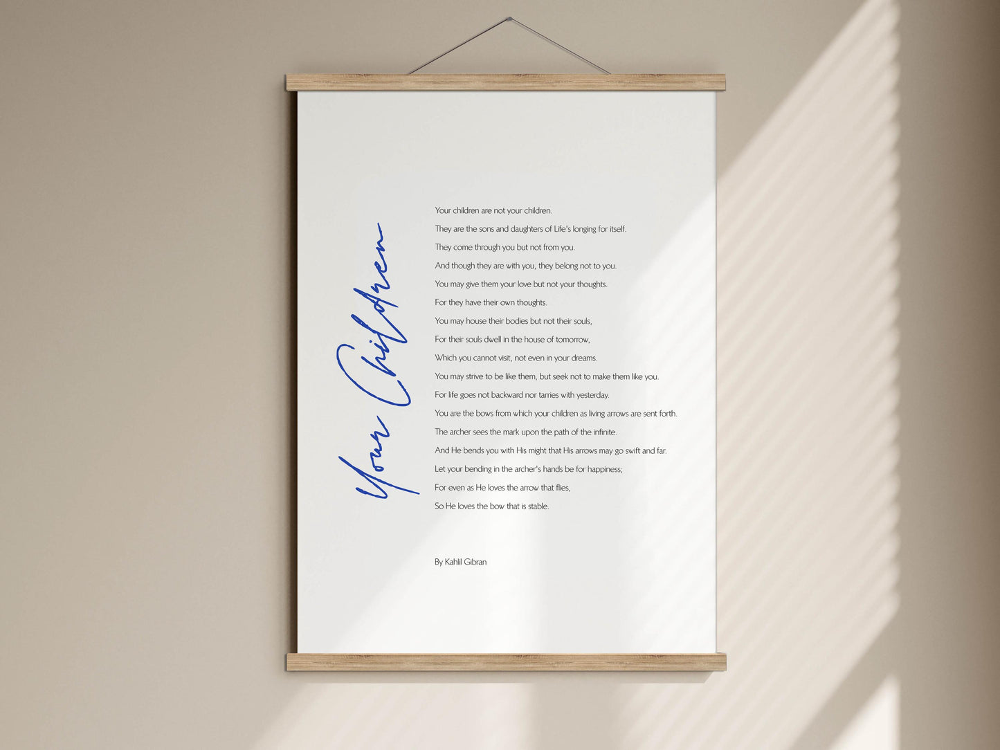 The image is a poster with a poem titled &quot;Your children are not your children&quot; written in blue cursive font.