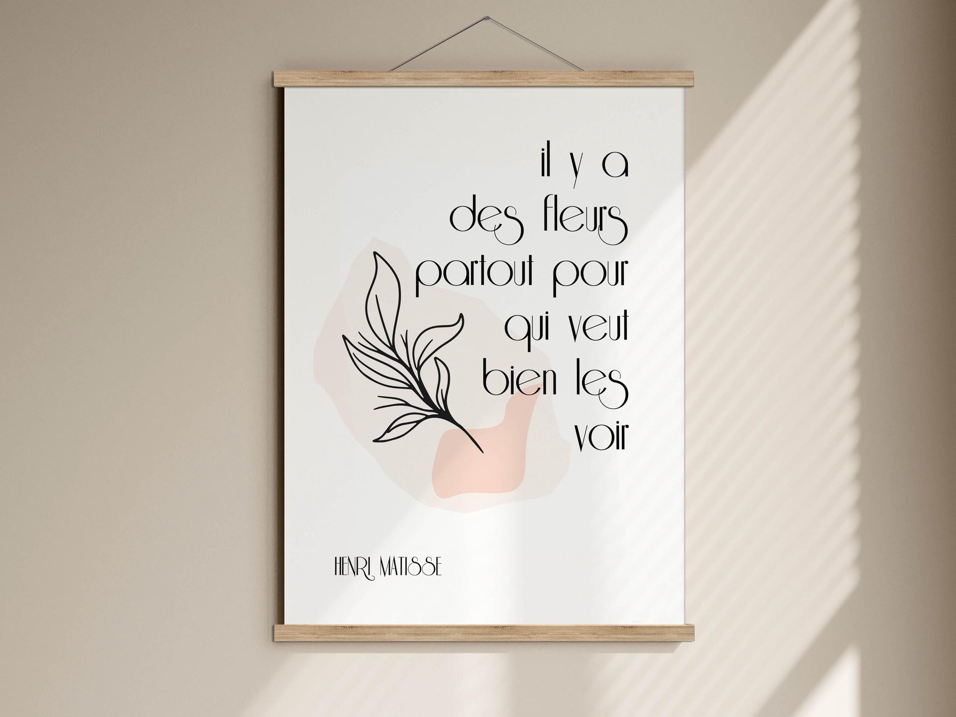 a poster with a quote in French, which reads &quot;il y a des flères partout pour qu&#39;il vieux bienn les voir&quot;, which translates to &quot;I am a flower, and I will be happy to see you again&quot;.