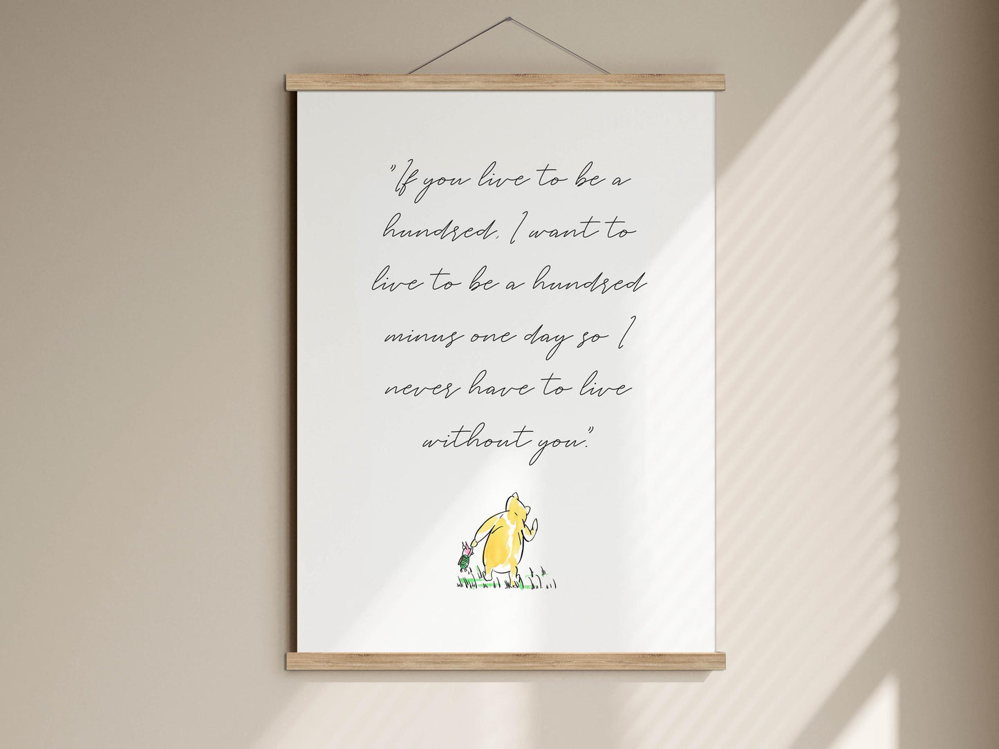 a quote from Winnie the Pooh, which reads: &quot;If you love to be a hundred, I want to live to be a hundred. I want to live to be a hundred one day. I never have to live without you.&quot;