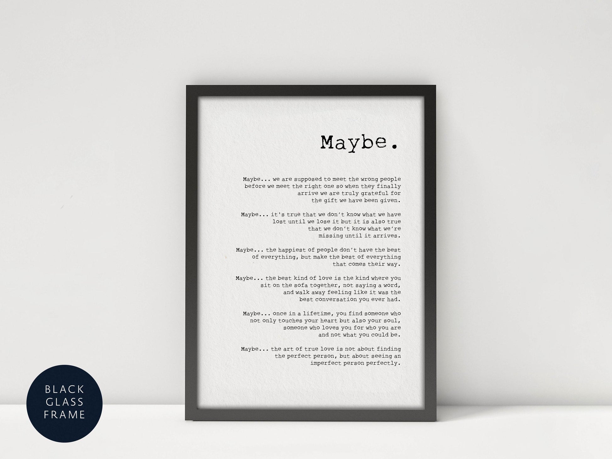 a framed text that reads &quot;MAYBE.&quot; The text is written in a black font on a white background, and it appears to be a thoughtful or reflective message.
