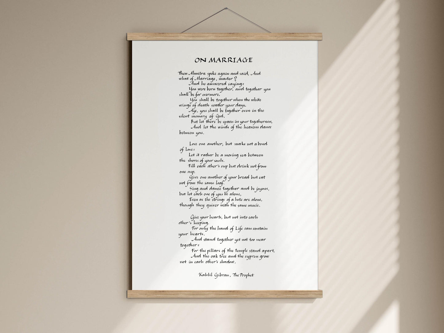 a framed poem titled &quot;ON MARRIAGE&quot; written in black text on a white background.