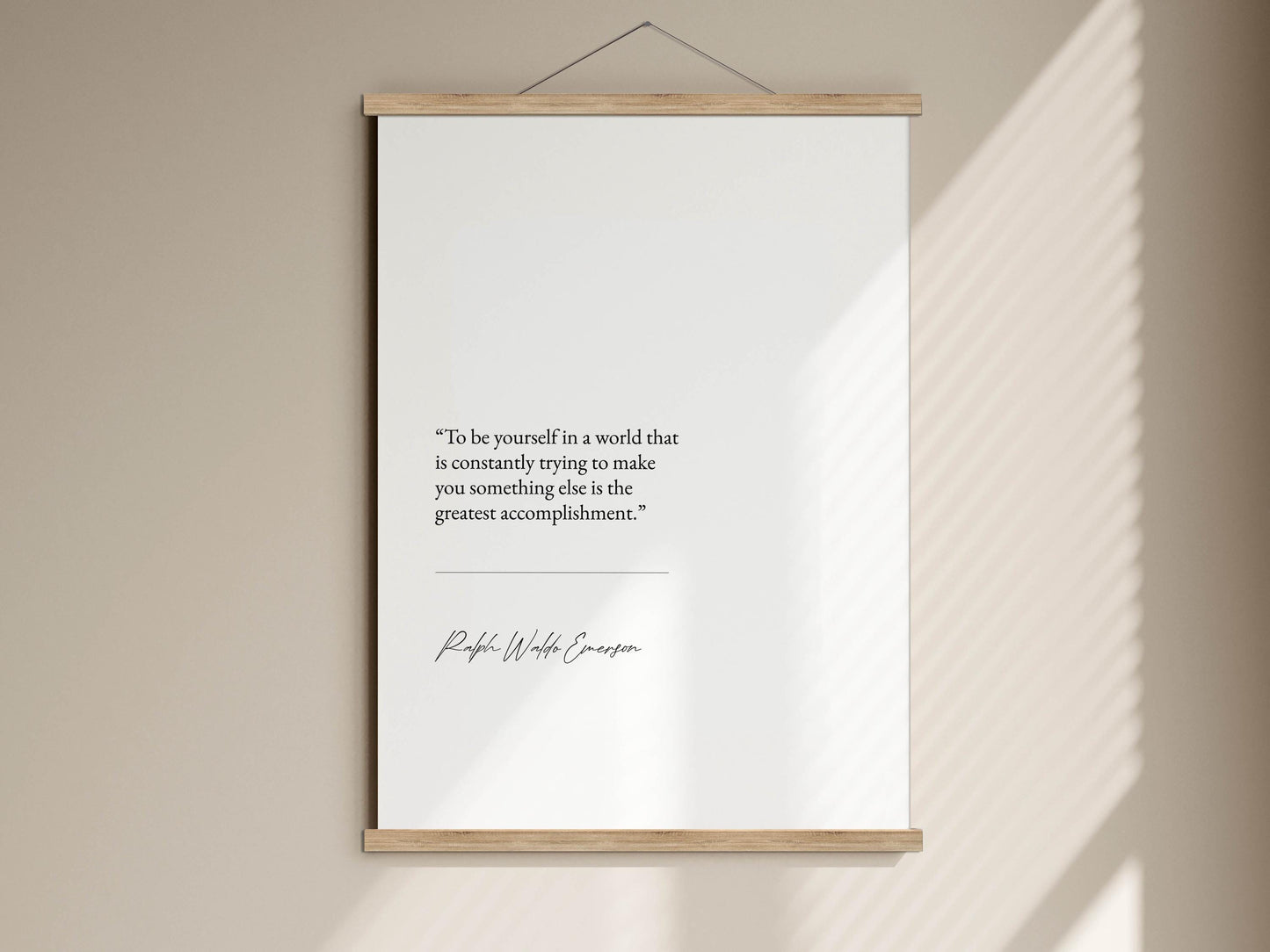 a quote by Ralph Waldo Emerson, which reads: &quot;To be yourself in a world that is constantly trying to make you something else is the greatest accomplishment.&quot;