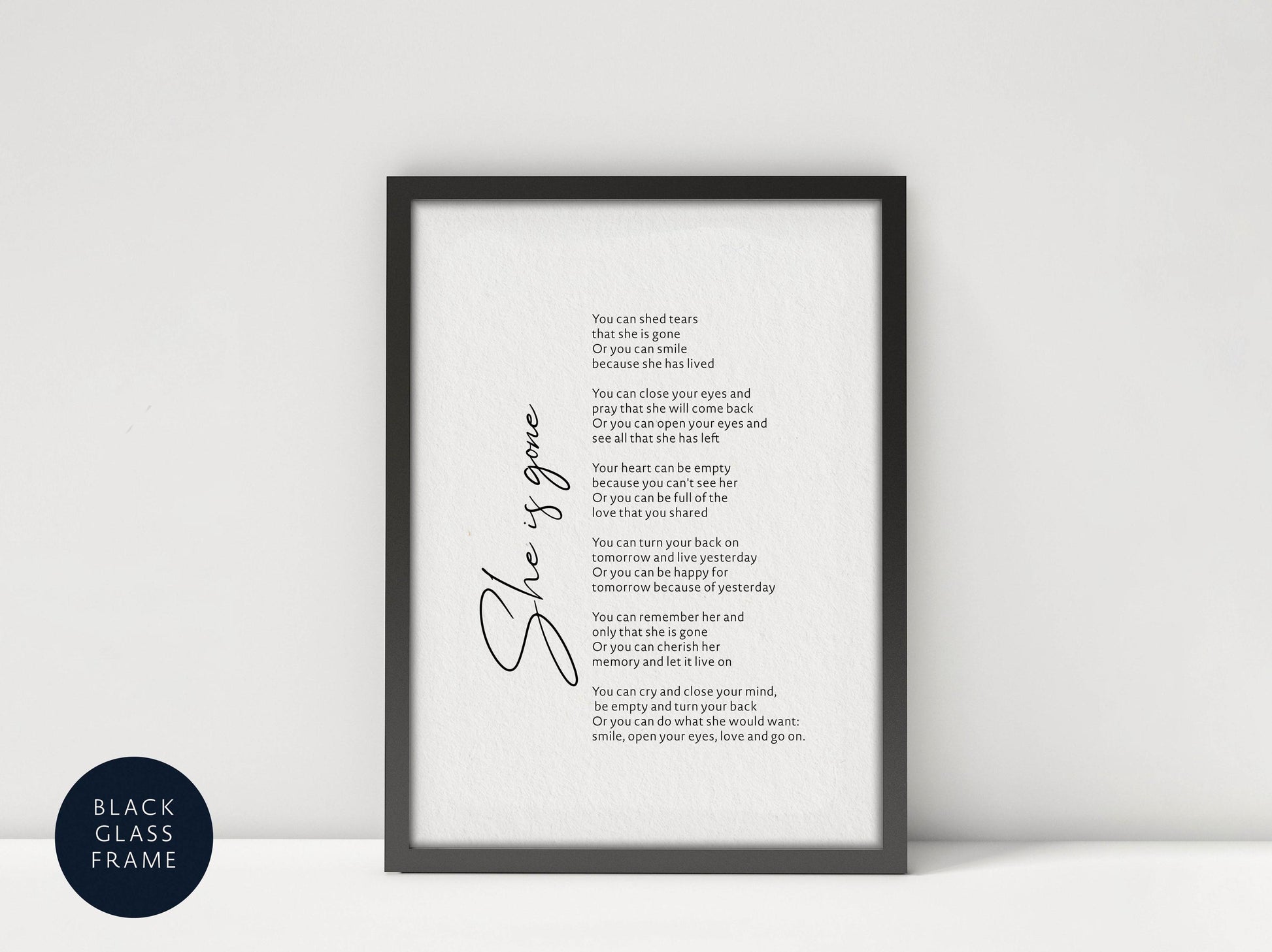 a black frame with a poem on it