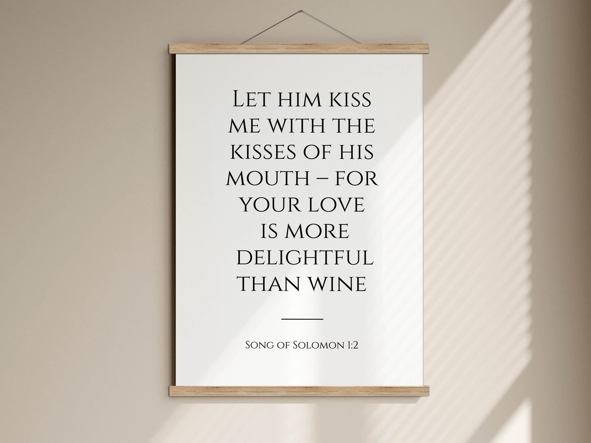 a poster with a quote from the song of Solomon 12, which reads &quot;Let him kiss me with the kisses of his mouth - for your love is more delightful than wine&quot;.