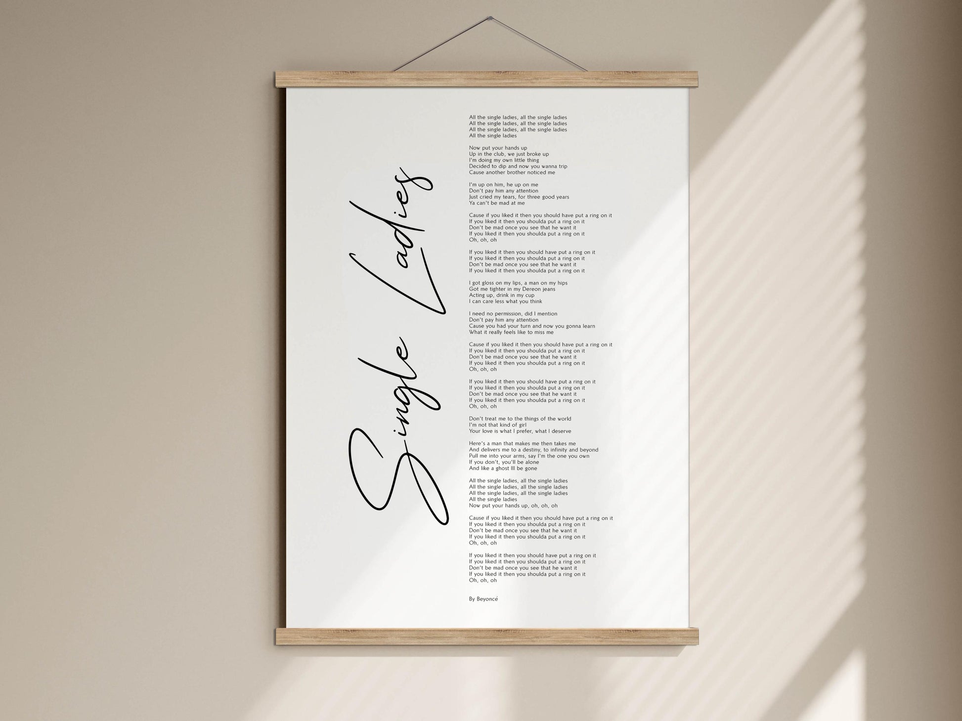 The image is a poster hanging on a wall, featuring a list of words in black text.