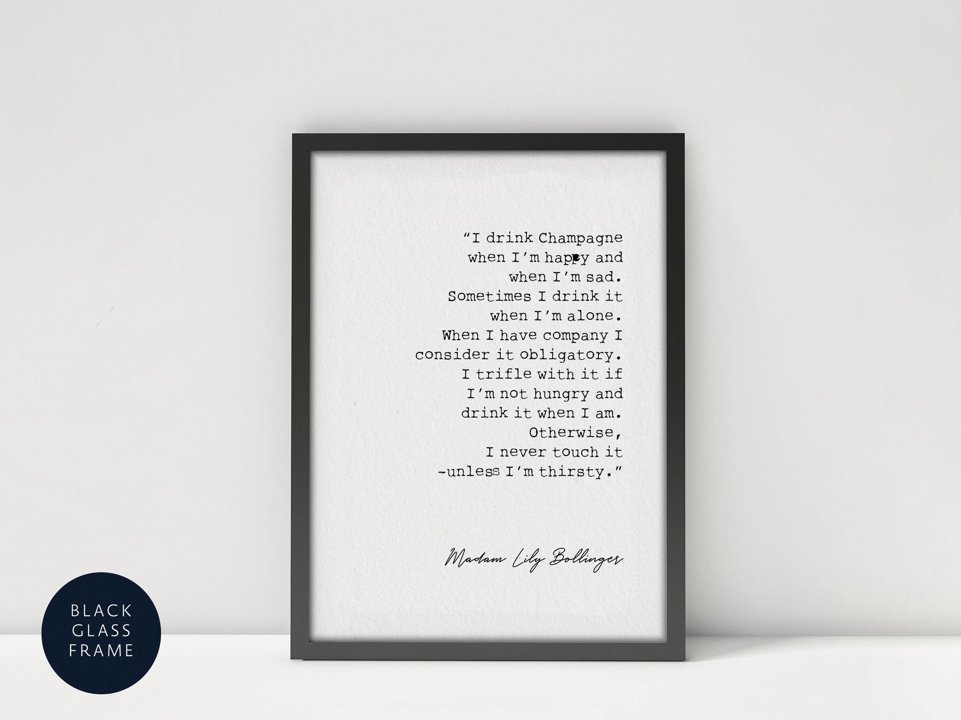 a framed quote by Maudie Lilly Bullinger, which reads: &quot;I drink Champagne when I&#39;m happy and sometimes I drink it when I&#39;m sad. Sometimes I drink it when I&#39;m alone. When I have company I consider it obligatory. I trifle with an 18-year-old. I&#39;m not hungry and I drink it when I&#39;m thirsty. I never drink it unless I&#39;m thirsty.&quot;