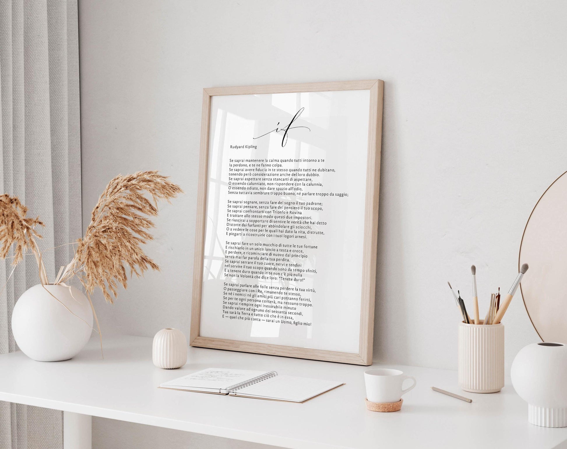 a framed poem titled &quot;Student Finding&quot; displayed on a white desk, accompanied by a notebook, a cup, and a vase with dried flowers.