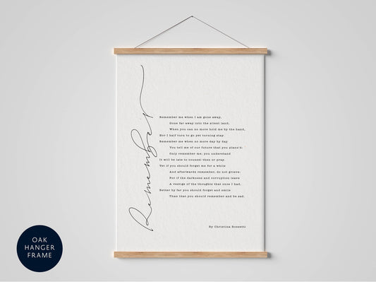 a framed poem titled &quot;Remember&quot; by Christina Rossetti, hanging on a wall.